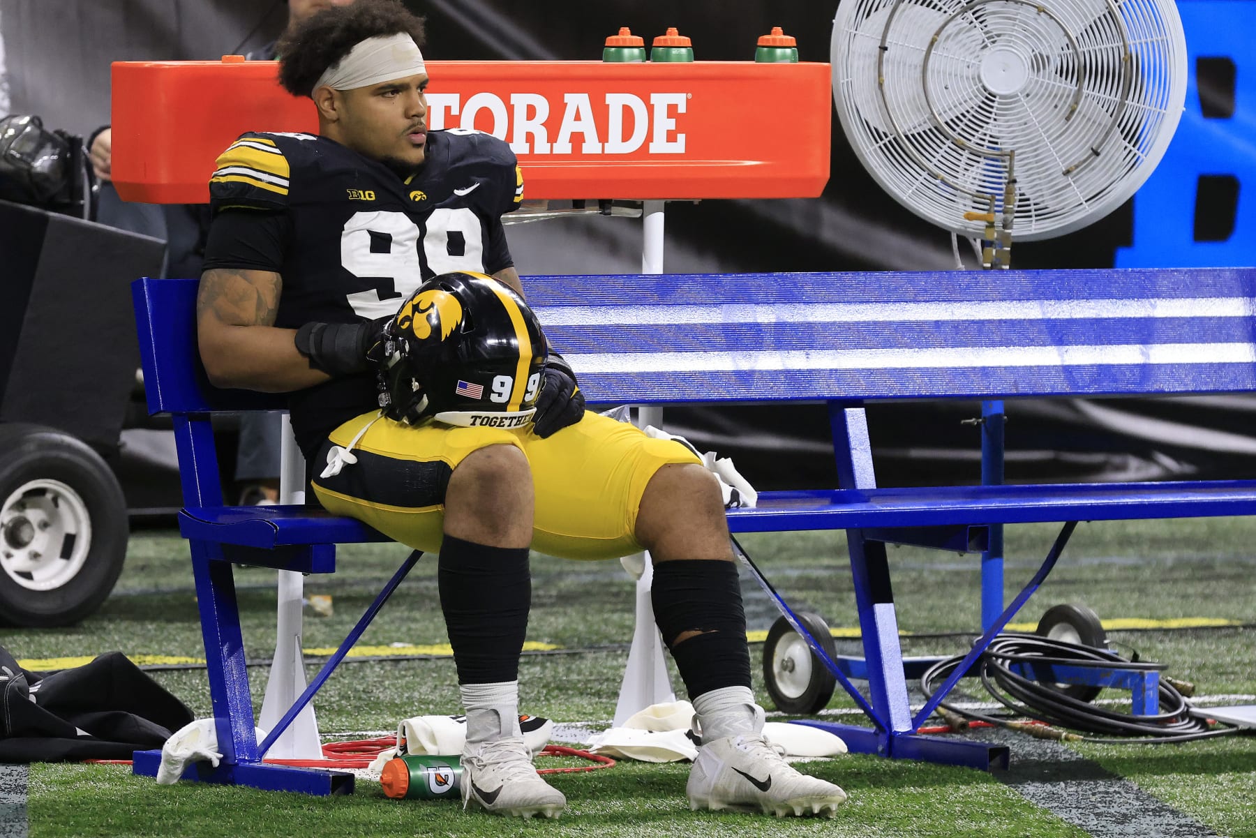 INDIANAPOLIS, INDIANA - DECEMBER 04: Noah Shannon #99 of the Iowa Hawkeyes sits on the sidelines after a loss to the Michigan Wolverines in the Big Ten Football Championship at Lucas Oil Stadium on December 04, 2021 in Indianapolis, Indiana. (Photo by Justin Casterline/Getty Images)