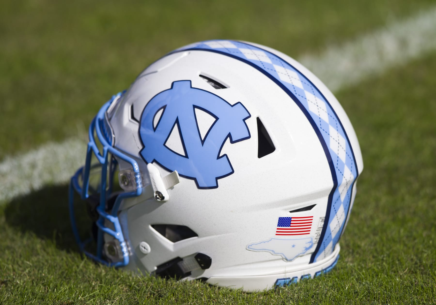 CHARLOTTESVILLE, VA - OCTOBER 27: North Carolina helmet resting on the field prior to the game between the North Carolina Tar Heels and the Virginia Cavaliers on October 27, 2018, at Scott Stadium in Charlottesville, VA. (Photo by Lee Coleman/Icon Sportswire via Getty Images)