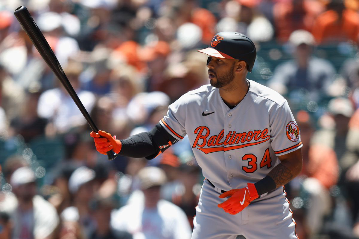 Orioles hang on to beat Red Sox 13-12 for 7th straight win as McCann homers  twice