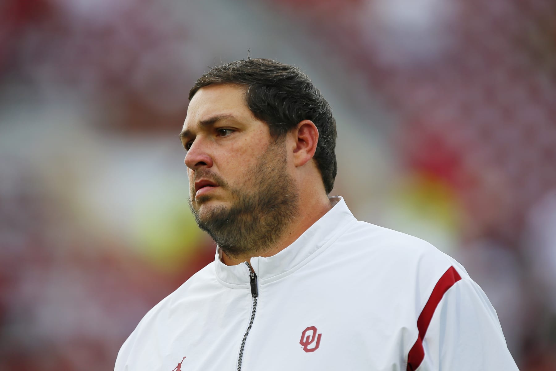 NORMAN, OK - SEPTEMBER 10: Offensive coordinator Jeff Lebby of the Oklahoma Sooners watches the team before a game against the Kent State Golden Flashes at Gaylord Family Oklahoma Memorial Stadium on September 10, 2022 in Norman, Oklahoma. Oklahoma won 33-3. (Photo by Brian Bahr/Getty Images)