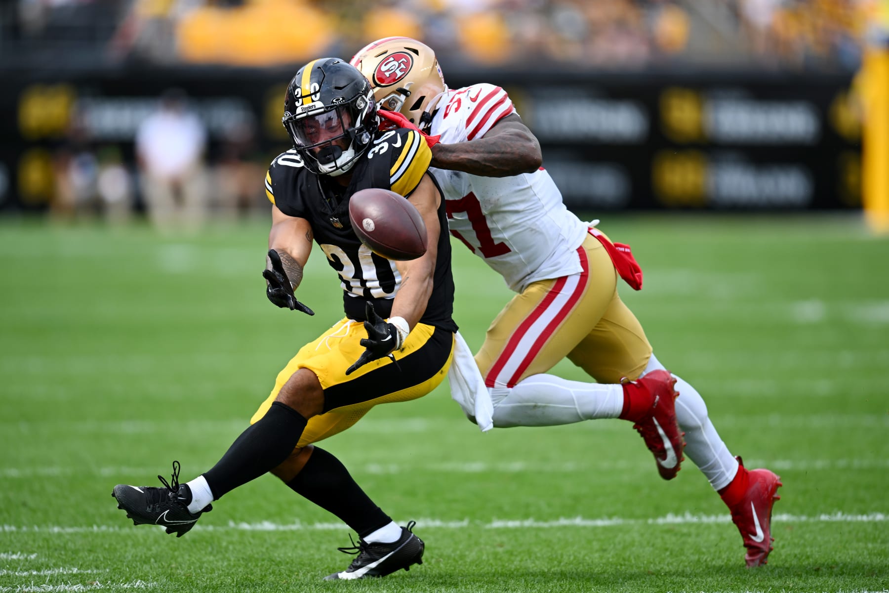 PITTSBURGH, PA - DECEMBER 24: Pittsburgh Steelers running back Jaylen  Warren (30) runs with the ball during the national football league game  between the Las Vegas Raiders and the Pittsburgh Steelers on