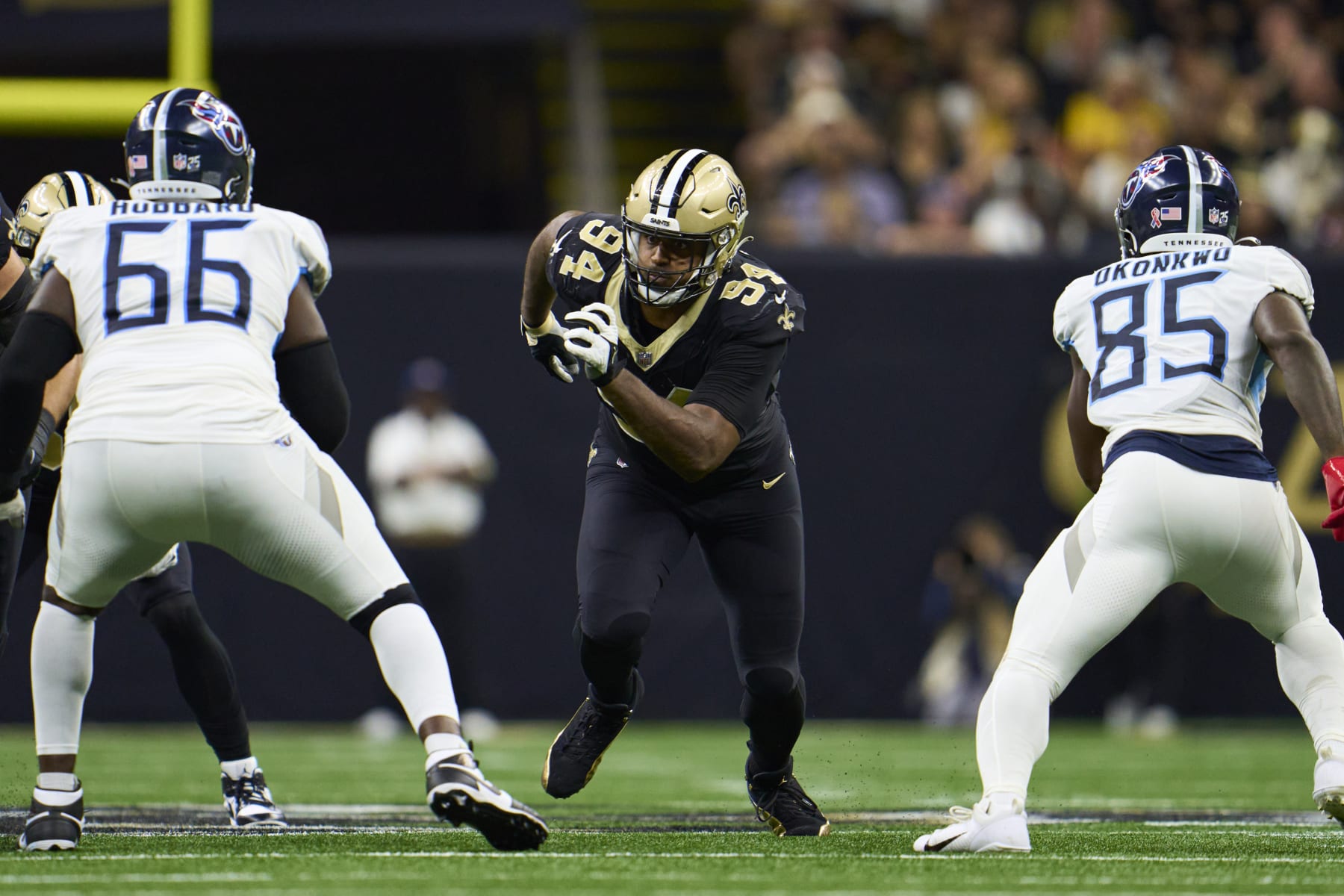 Los Angeles Rams wide receiver Tutu Atwell (15) catches the ball in front  of New Orleans Saints safety Chris Harris Jr. (19) to score a touchdown  during an NFL football game, Sunday