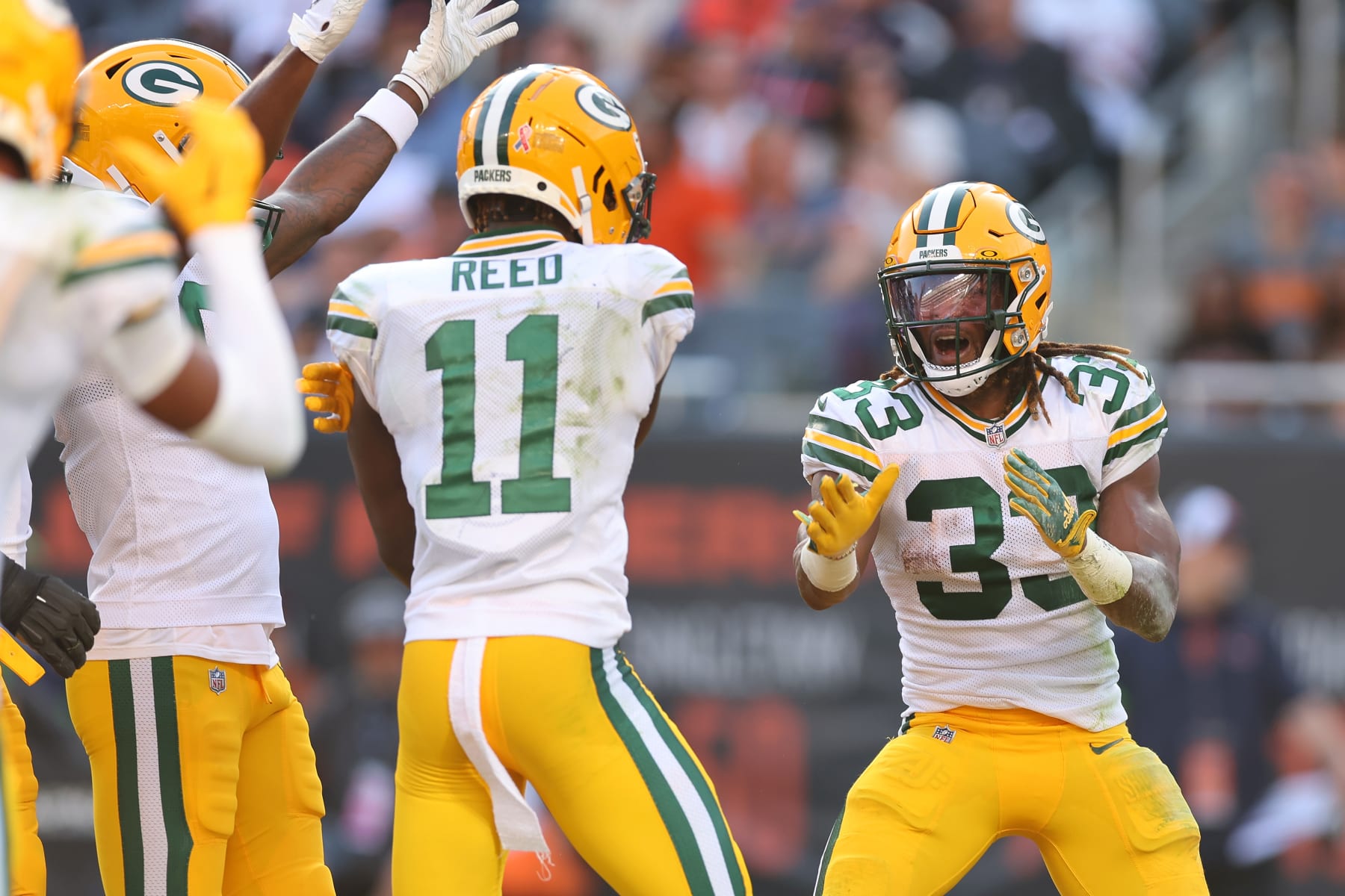 CHICAGO, ILLINOIS - SEPTEMBER 10: Aaron Jones #33 of the Green Bay Packers celebrates his rushing touchdown against the Chicago Bears during the first half at Soldier Field on September 10, 2023 in Chicago, Illinois. (Photo by Michael Reaves/Getty Images)