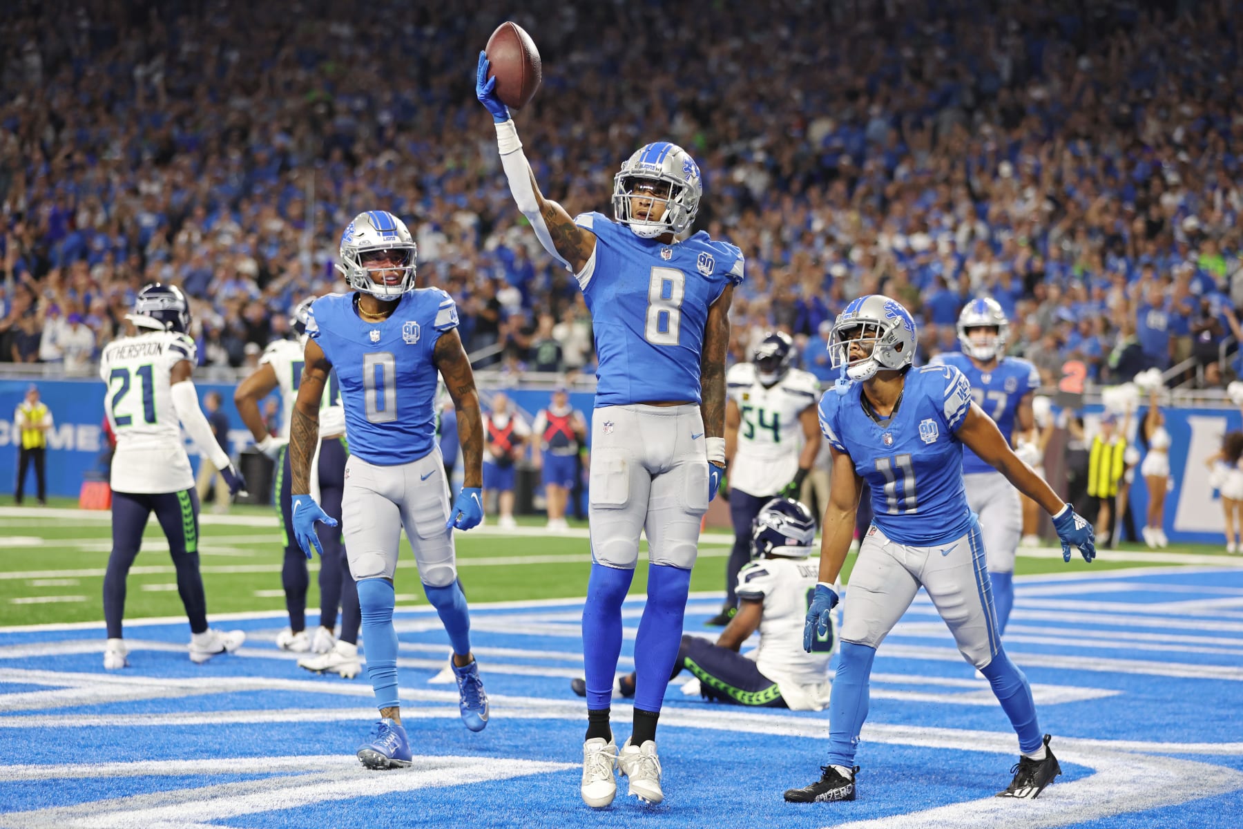 DETROIT, MICHIGAN - SEPTEMBER 17: Josh Reynolds #8 of the Detroit Lions celebrates a touchdown during the fourth quarter in the game against the Seattle Seahawks at Ford Field on September 17, 2023 in Detroit, Michigan. (Photo by Gregory Shamus/Getty Images)