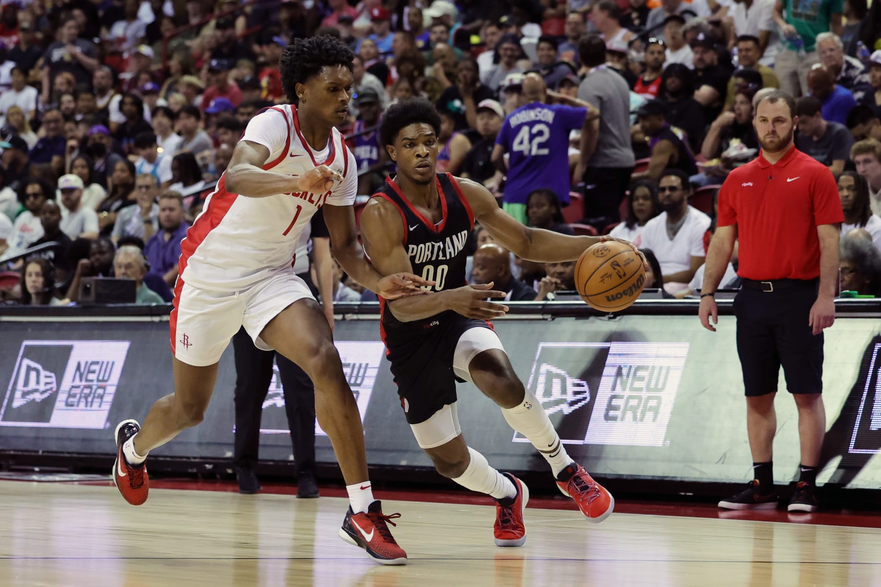 LAS VEGAS, NEVADA - JULY 07: Scoot Henderson #00 of the Portland Trail Blazers dribbles the ball against Amen Thompson #1 of the Houston Rockets during the third quarter at the Thomas & Mack Center on July 07, 2023 in Las Vegas, Nevada. (Photo by Ethan Miller/Getty Images)