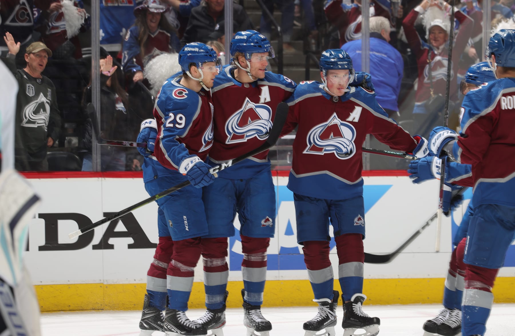 DENVER, COLORADO - APRIL 18: Nathan MacKinnon #29, Mikko Rantanen #96 and Cale Makar #8 of the Colorado Avalanche celebrate a goal against the Seattle Kraken in Game One of the First Round of the 2023 Stanley Cup Playoffs at Ball Arena on April 18, 2023 in Denver, Colorado. (Photo by Michael Martin/NHLI via Getty Images)