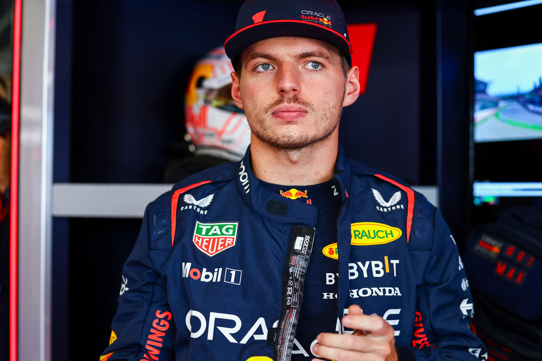 SUZUKA, JAPAN - SEPTEMBER 24: Max Verstappen of the Netherlands and Oracle Red Bull Racing prepares to drive in the garage prior to the F1 Grand Prix of Japan at Suzuka International Racing Course on September 24, 2023 in Suzuka, Japan. (Photo by Mark Thompson/Getty Images)
