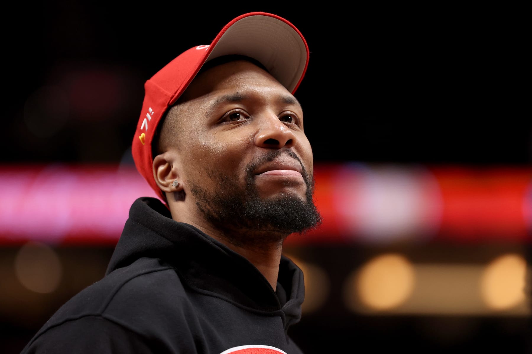 PORTLAND, OREGON - APRIL 09: Damian Lillard #0 of the Portland Trail Blazers looks on during the third quarter against the Golden State Warriors at Moda Center on April 09, 2023 in Portland, Oregon. NOTE TO USER: User expressly acknowledges and agrees that, by downloading and/or using this Photograph, user is consenting to the terms and conditions of the Getty Images License Agreement. (Photo by Steph Chambers/Getty Images)