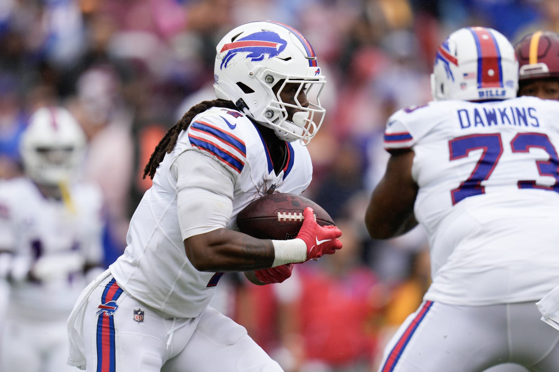 LANDOVER, MARYLAND - SEPTEMBER 24: James Cook #4 of the Buffalo Bills runs the ball during the second quarter of a game against the Washington Commanders at FedExField on September 24, 2023 in Landover, Maryland. (Photo by Jess Rapfogel/Getty Images)