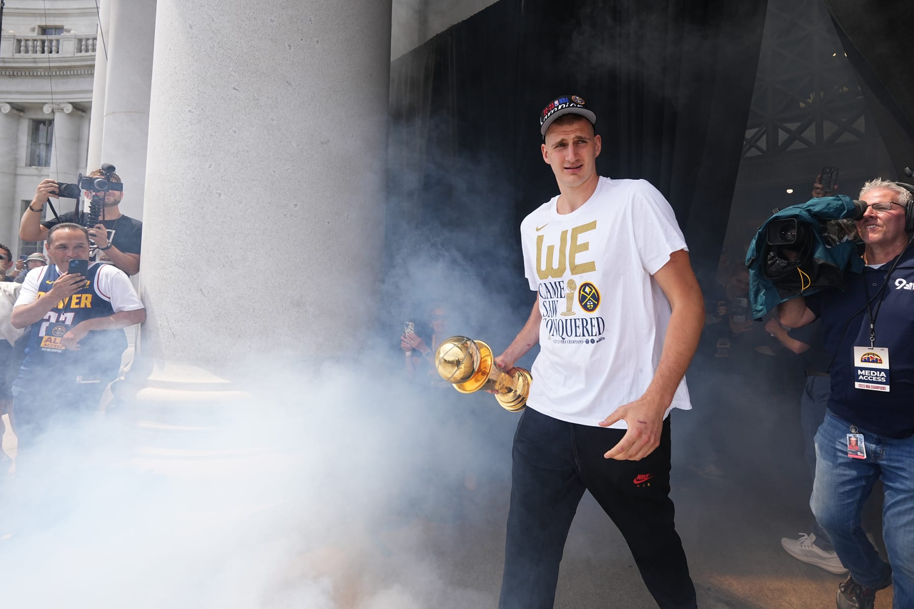 DENVER, CO - JUNE 15: Nikola Jokic #15 of the Denver Nuggets celebrates during the 2023 Denver Nuggets Championship Parade on June 15, 2023 in Denver, Colorado. NOTE TO USER: User expressly acknowledges and agrees that, by downloading and/or using this Photograph, user is consenting to the terms and conditions of the Getty Images License Agreement. Mandatory Copyright Notice: Copyright 2023 NBAE (Photo by Garrett Ellwood/NBAE via Getty Images)