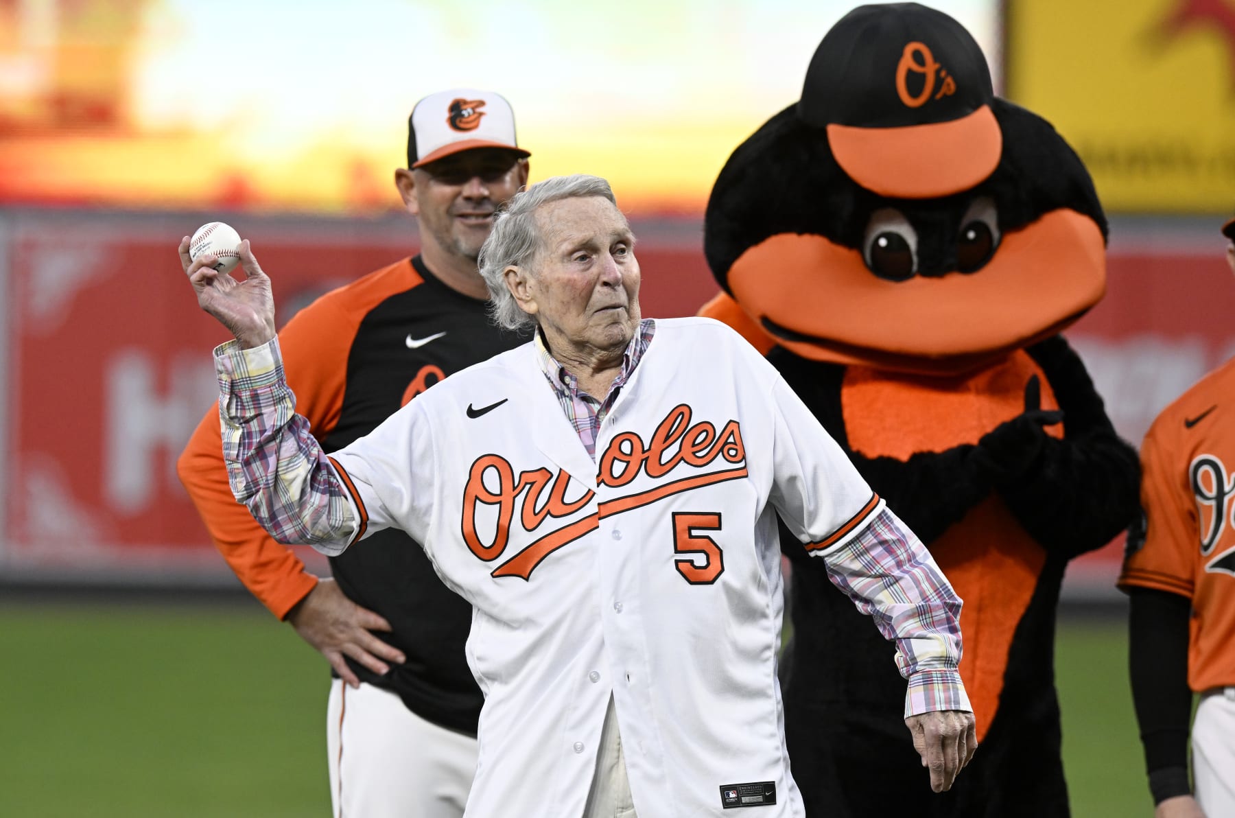 BALTIMORE, MARYLAND - SEPTEMBER 24: Former Baltimore Orioles and Hall of Famer Brooks Robinson throws out the first pitch before the game between the Baltimore Orioles and the Houston Astros  at Oriole Park at Camden Yards on September 24, 2022 in Baltimore, Maryland. (Photo by Greg Fiume/Getty Images)