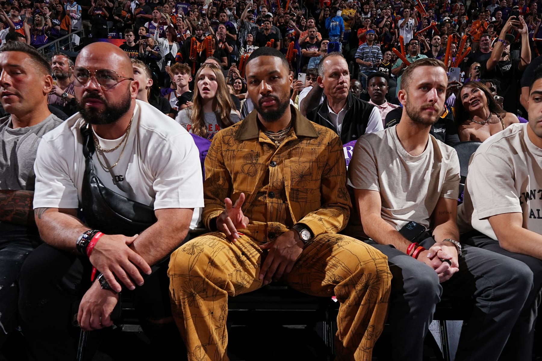 PHOENIX, AZ - MAY 5: Damian Lillard #0 of the Portland Trail Blazers attends Game Three of the Western Conference Semi-Finals of the 2023 NBA Playoffs between the Denver Nuggets and the Phoenix Suns on May 5, 2023 at Footprint Center in Phoenix, Arizona. NOTE TO USER: User expressly acknowledges and agrees that, by downloading and or using this photograph, user is consenting to the terms and conditions of the Getty Images License Agreement. Mandatory Copyright Notice: Copyright 2023 NBAE (Photo by Garrett Ellwood/NBAE via Getty Images)