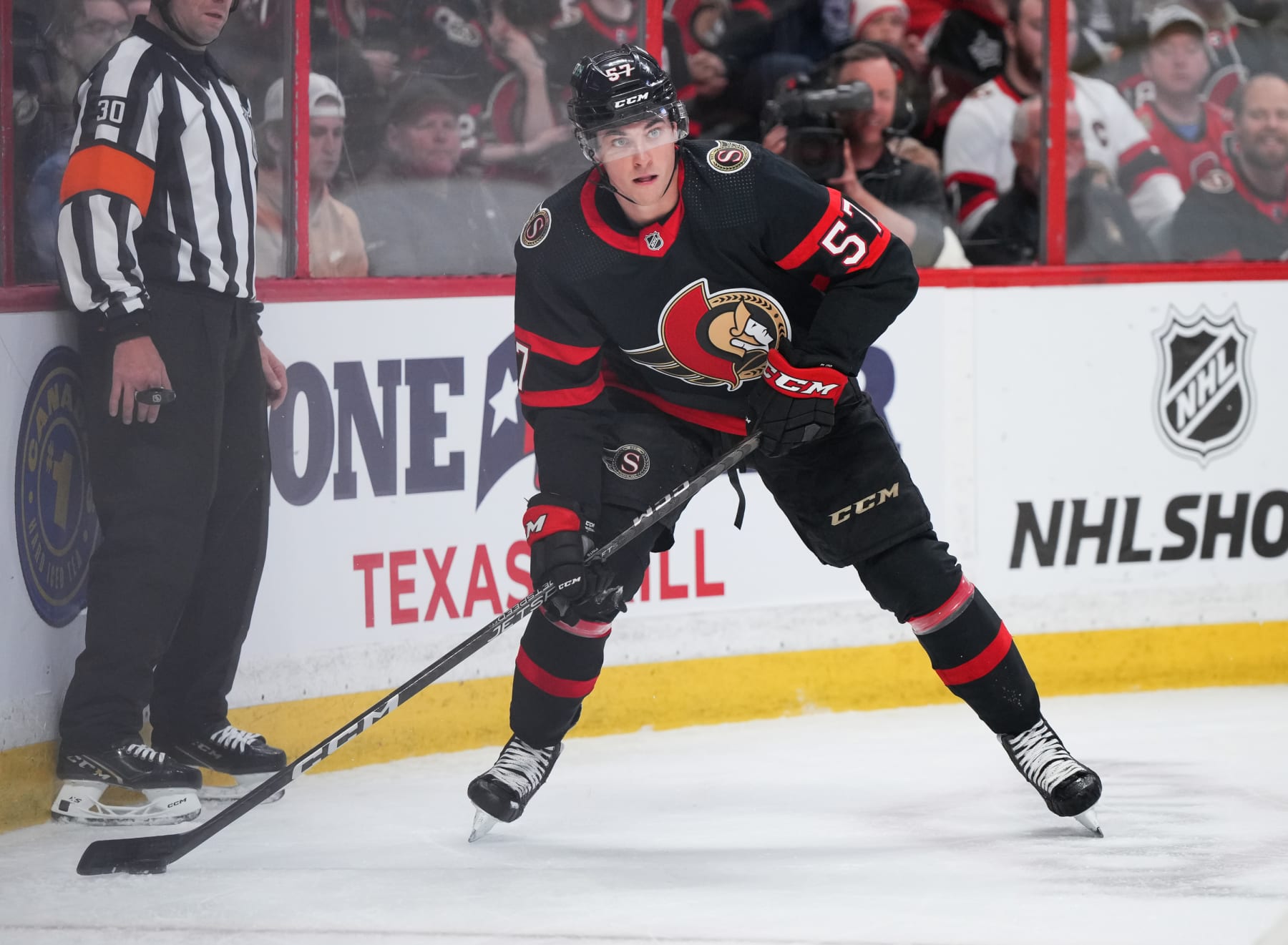 OTTAWA, CANADA - APRIL 10:  Shane Pinto #57 of the Ottawa Senators skates against the Carolina Hurricanes at Canadian Tire Centre on April 10, 2023 in Ottawa, Ontario, Canada.  (Photo by André Ringuette/NHLI via Getty Images)