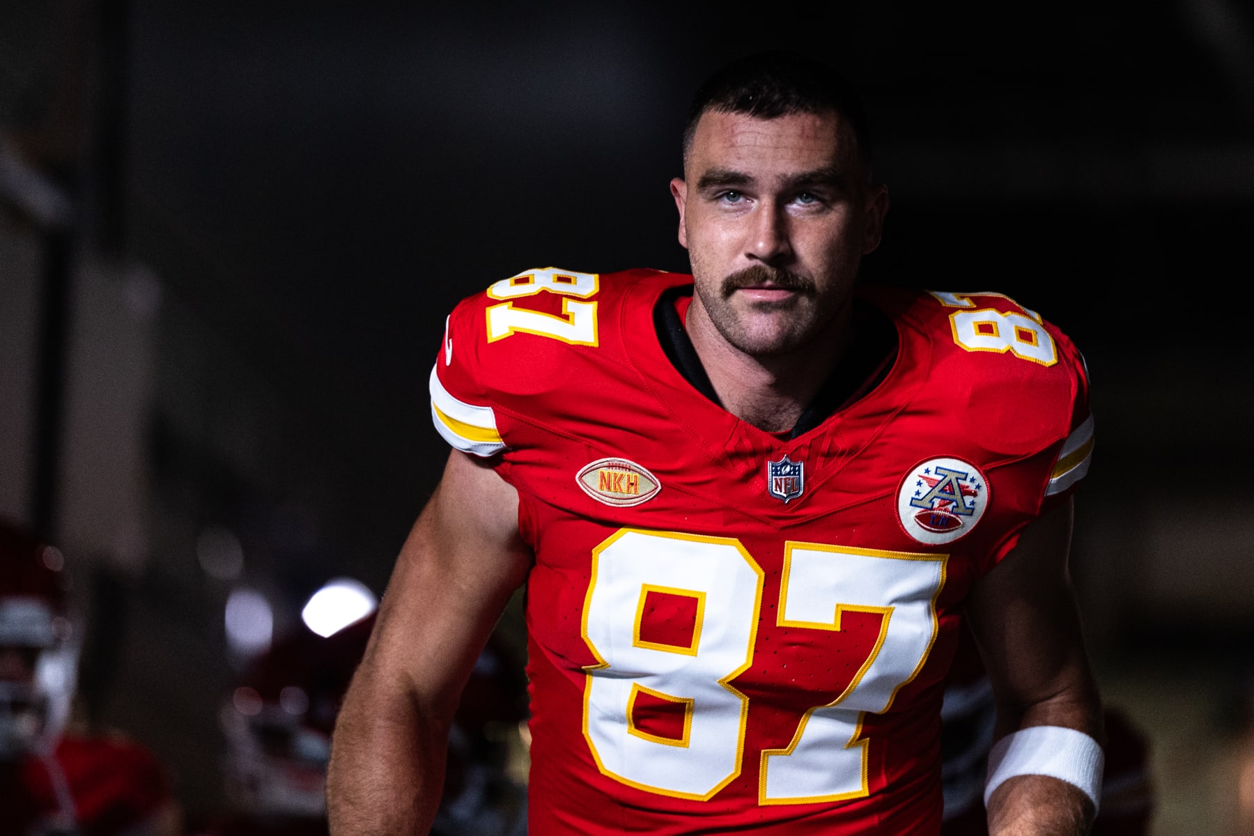 Why are the Kansas City Chiefs wearing 'NKH' patches on their NFL jerseys?