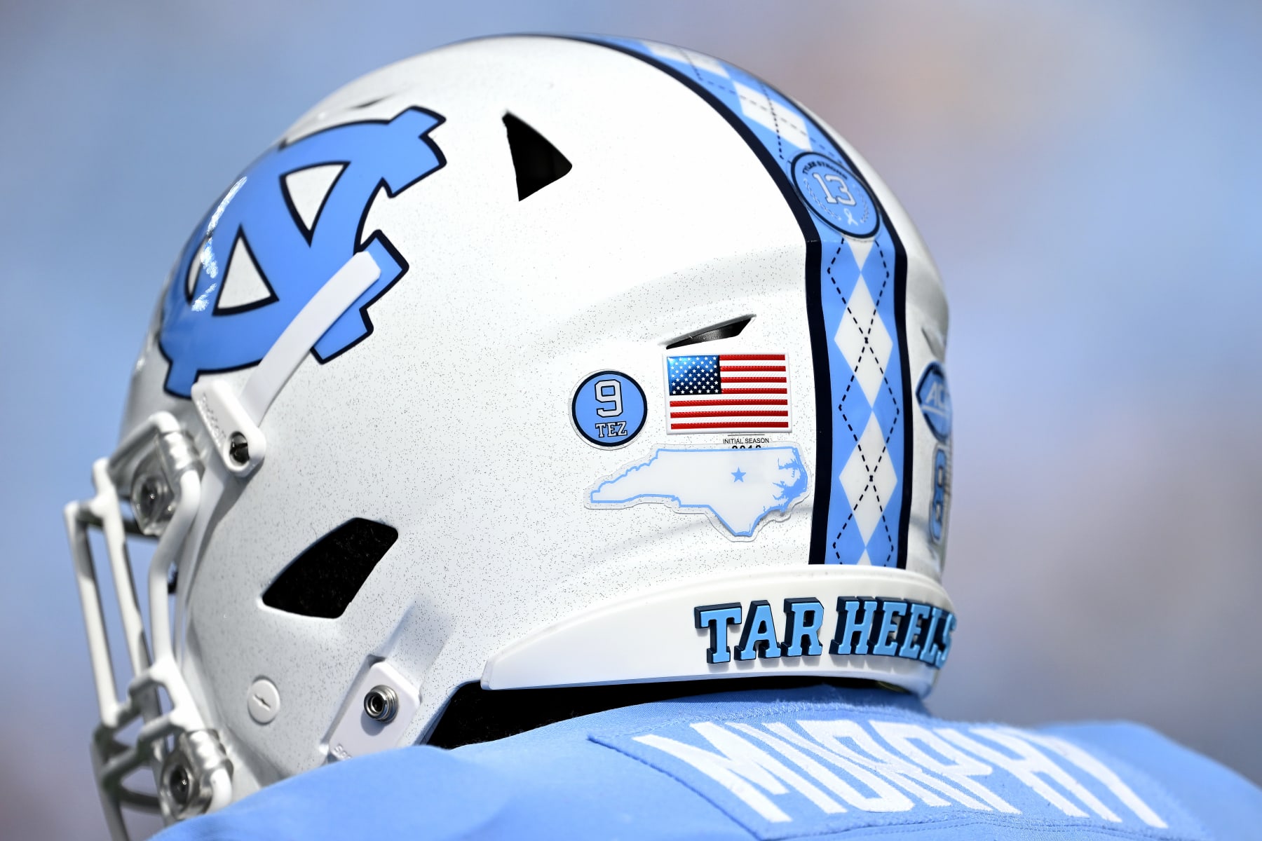 CHAPEL HILL, NORTH CAROLINA - SEPTEMBER 09: Myles Murphy #8 wears a helmet sticker in support of Devontez "Tez" Walker #9 of the North Carolina Tar Heels of the North Carolina Tar Heels during the game against the Appalachian State Mountaineers at Kenan Memorial Stadium on September 09, 2023 in Chapel Hill, North Carolina. (Photo by Grant Halverson/Getty Images)