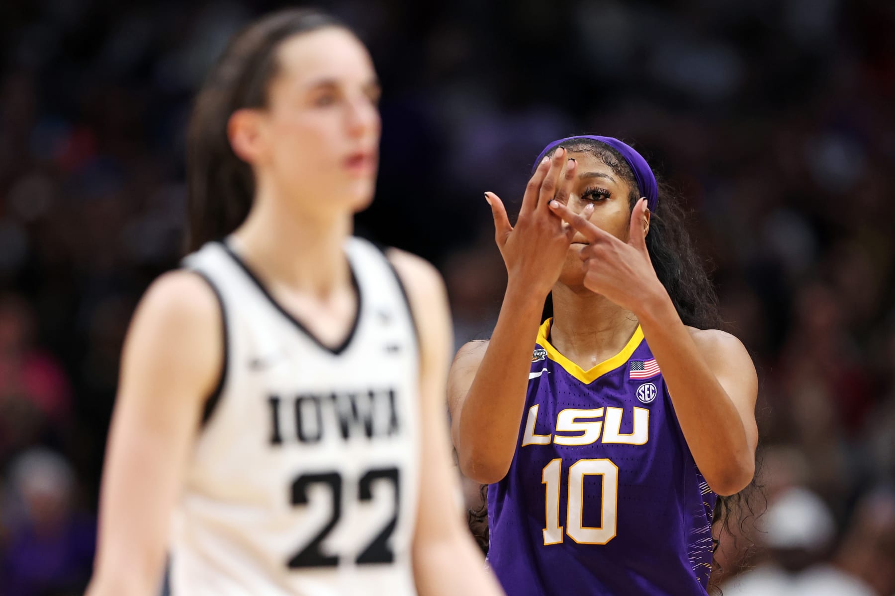 DALLAS, TEXAS - APRIL 02: Angel Reese #10 of the LSU Lady Tigers reacts towards Caitlin Clark #22 of the Iowa Hawkeyes during the fourth quarter during the 2023 NCAA Women's Basketball Tournament championship game at American Airlines Center on April 02, 2023 in Dallas, Texas. (Photo by Maddie Meyer/Getty Images)