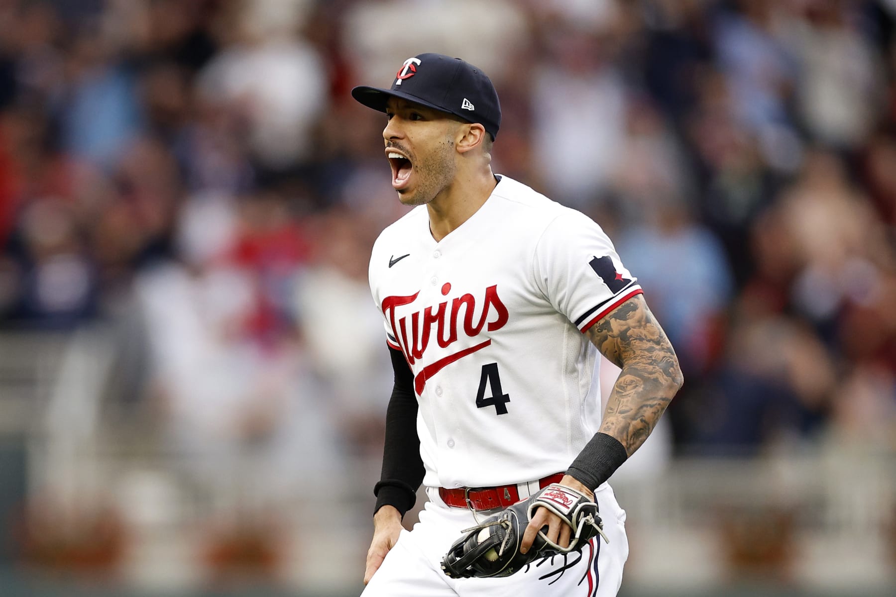 Photo: Twins Carlos Correa Hits a Pitch on Opening Day 2023