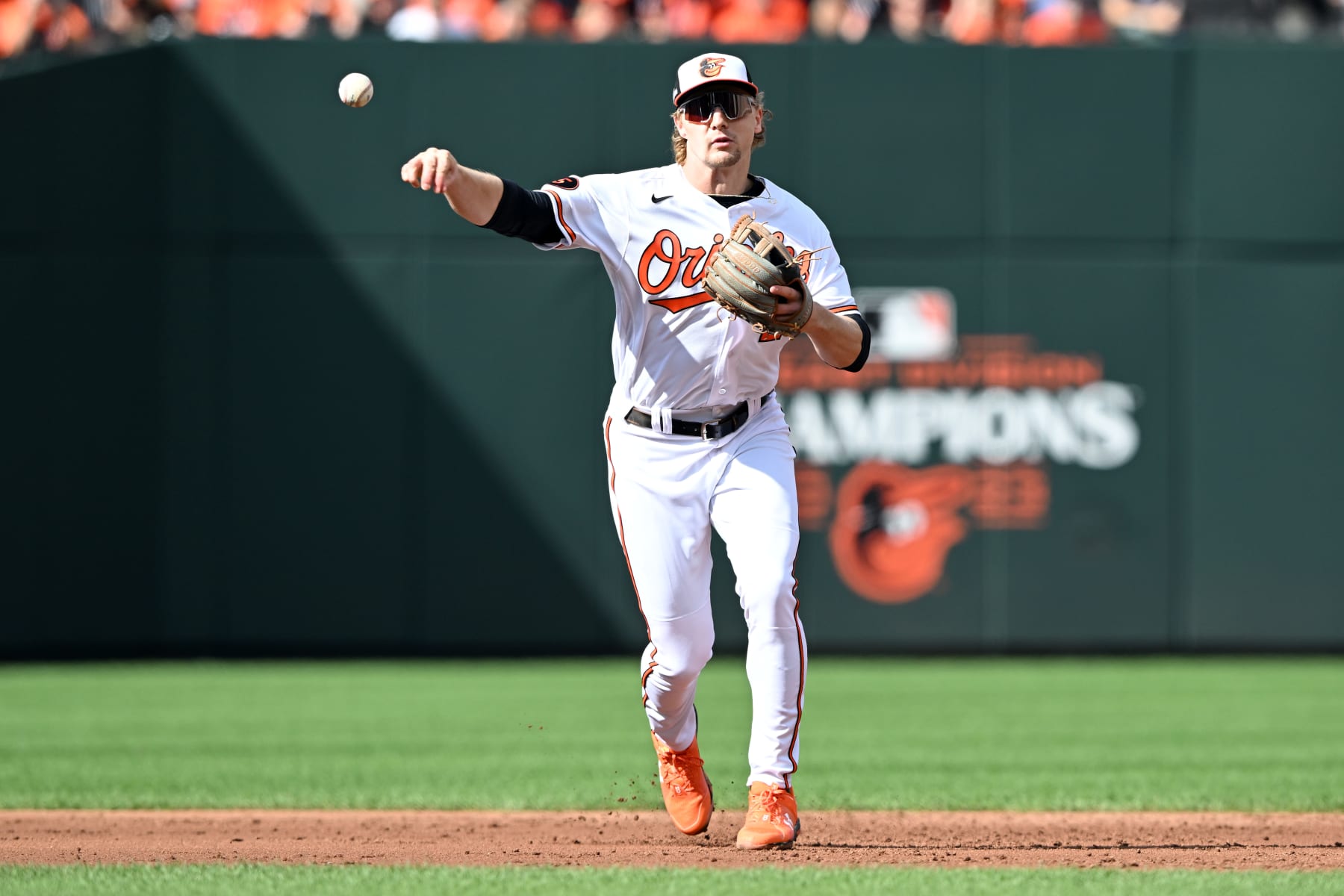 BALTIMORE, MARYLAND - OCTOBER 07: Gunnar Henderson #2 of the Baltimore Orioles throws out Marcus Semien #2 of the Texas Rangers (not pictured) during the third inning of Game One of the American League Division Series at Oriole Park at Camden Yards on October 07, 2023 in Baltimore, Maryland. (Photo by Greg Fiume/Getty Images)