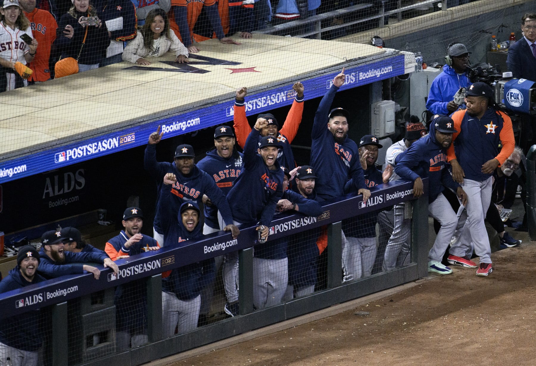 MINNEAPOLIS, MINNESOTA - OCTOBER 11: Members of the Houston Astros celebrate in the dugout after winning Game Four of the Division Series against the Minnesota Twins at Target Field on October 11, 2023 in Minneapolis, Minnesota. (Photo by Stephen Maturen/Getty Images)