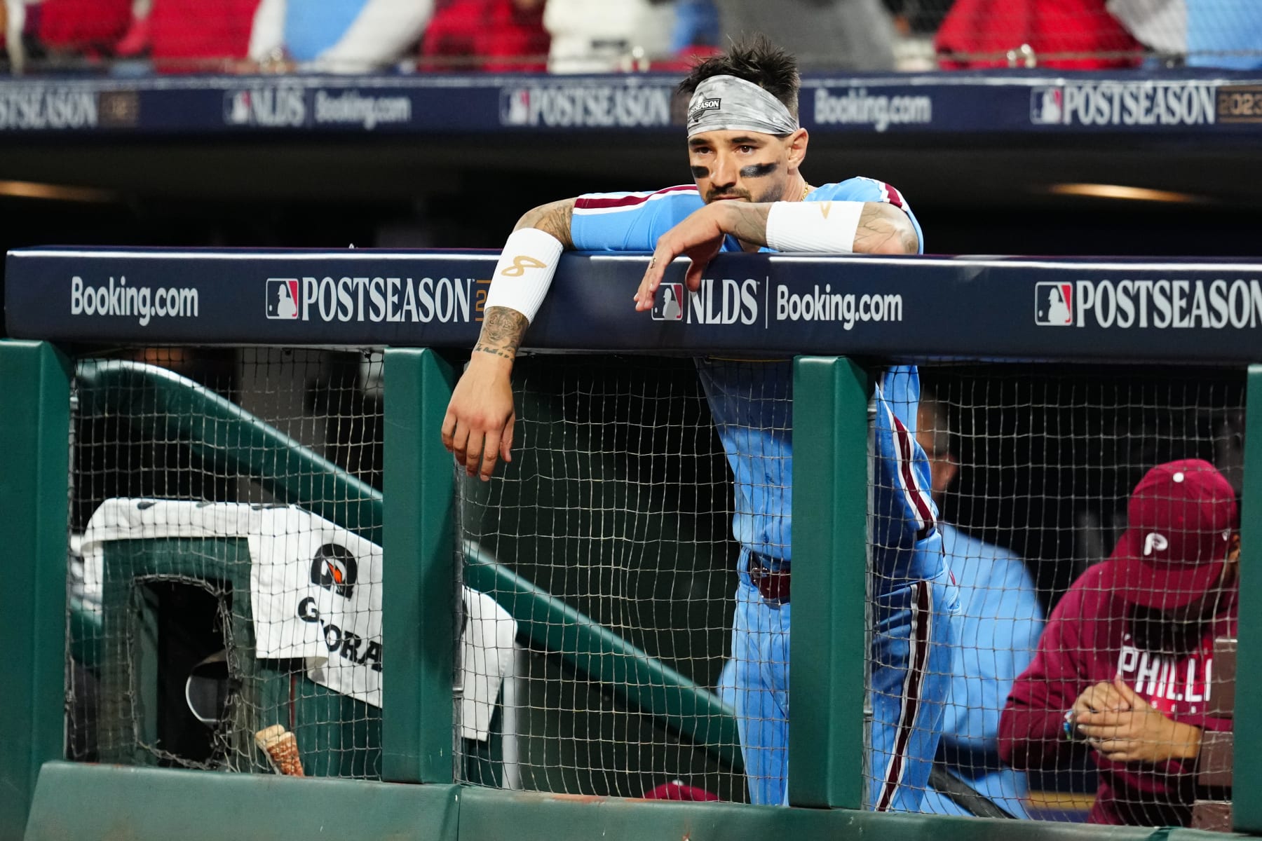 PHILADELPHIA, PA - OCTOBER 12: Nick Castellanos #8 of the Philadelphia Phillies looks on from the dugout after hitting a solo home run in the sixth inning during Game 4 of the Division Series between the Atlanta Braves and the Philadelphia Phillies at Citizens Bank Park on Thursday, October 12, 2023 in Philadelphia, Pennsylvania. (Photo by Mary DeCicco/MLB Photos via Getty Images)