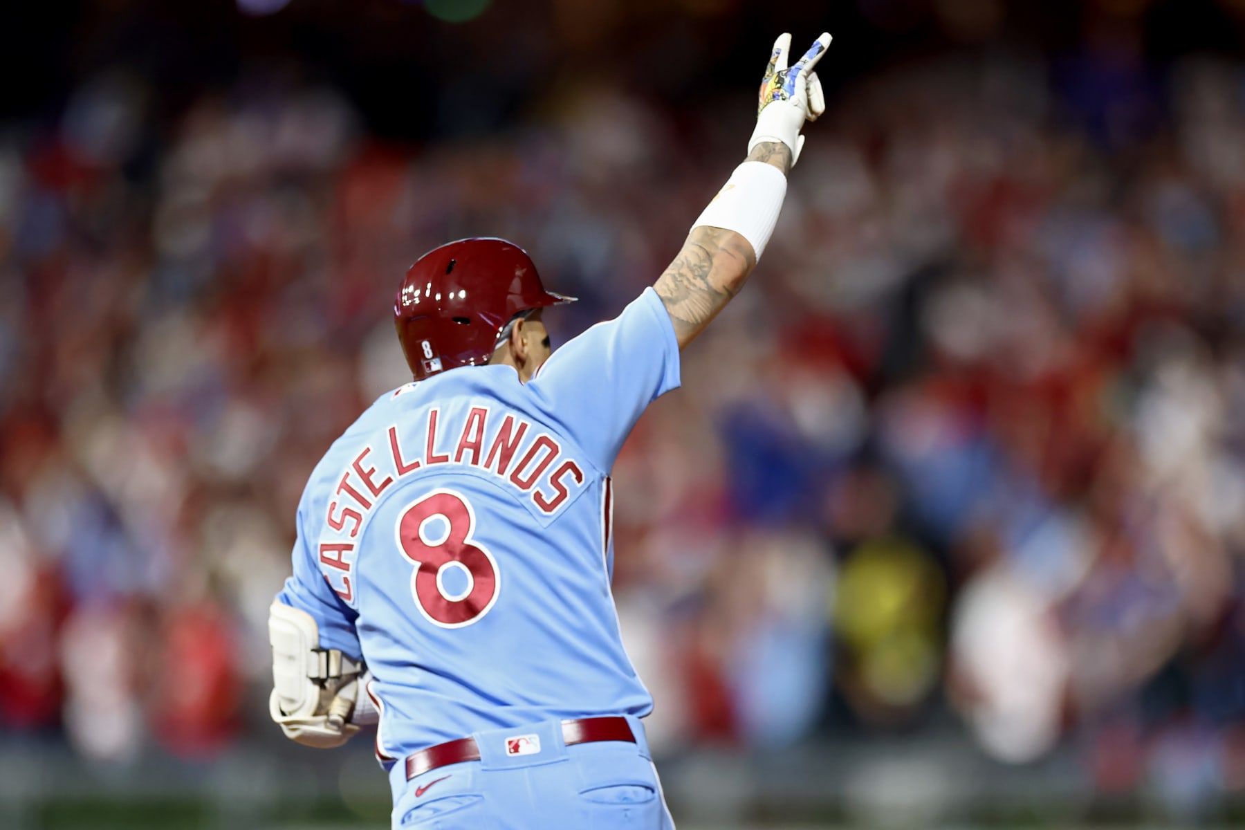 PHILADELPHIA, PENNSYLVANIA - OCTOBER 12: Nick Castellanos #8 of the Philadelphia Phillies rounds the bases after hitting a home run in the sixth inning against the Atlanta Braves during Game Four of the Division Series at Citizens Bank Park on October 12, 2023 in Philadelphia, Pennsylvania. (Photo by Tim Nwachukwu/Getty Images)