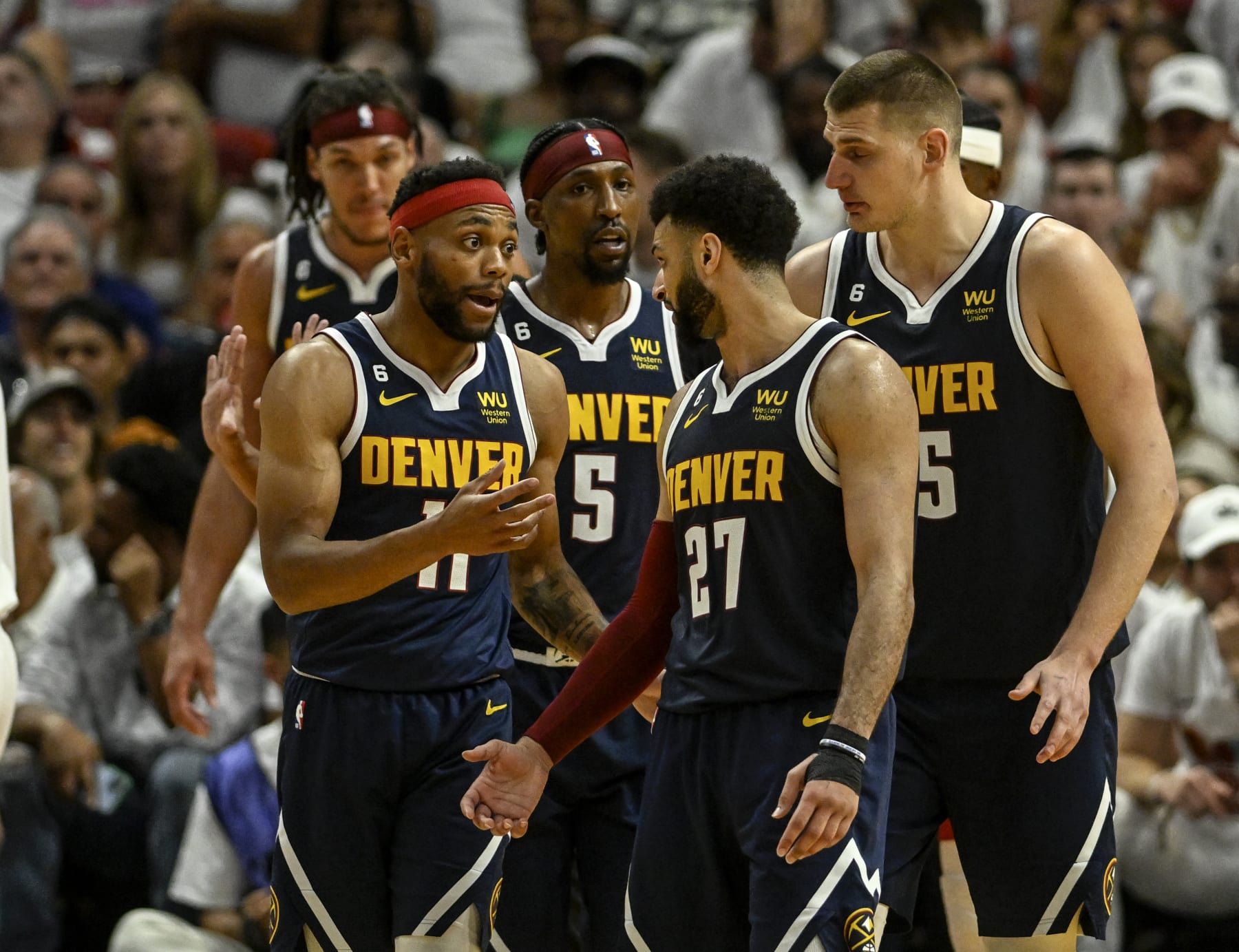 MIAMI, FL - JUNE 9: Bruce Brown (11), Jamal Murray (27), Nikola Jokic (15), Kentavious Caldwell-Pope (5) and Aaron Gordon (50) of the Denver Nuggets work together to dissect the Miami Heat in the fourth quarter of the Nuggets' 108-95 win during Game 4 of the NBA Finals at the Kaseya Center in Miami on Friday, June 9, 2023. (Photo by AAron Ontiveroz/The Denver Post)
