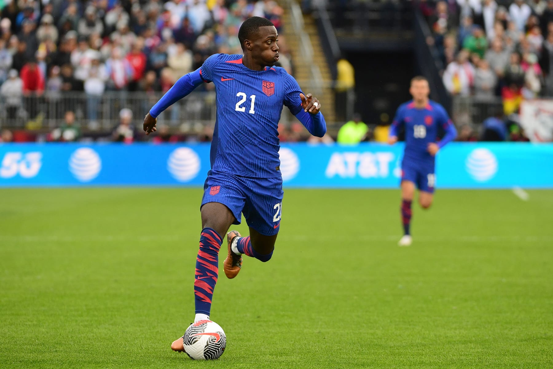 EAST HARTFORD, CONNECTICUT - OCTOBER 14: Timothy Weah #21 of the United States controls the ball during the first half of an international friendly match against Germany at Pratt & Whitney Stadium on October 14, 2023 in East Hartford, Connecticut. (Photo by Howard Smith/ISI Photos/USSF/Getty Images for USSF)