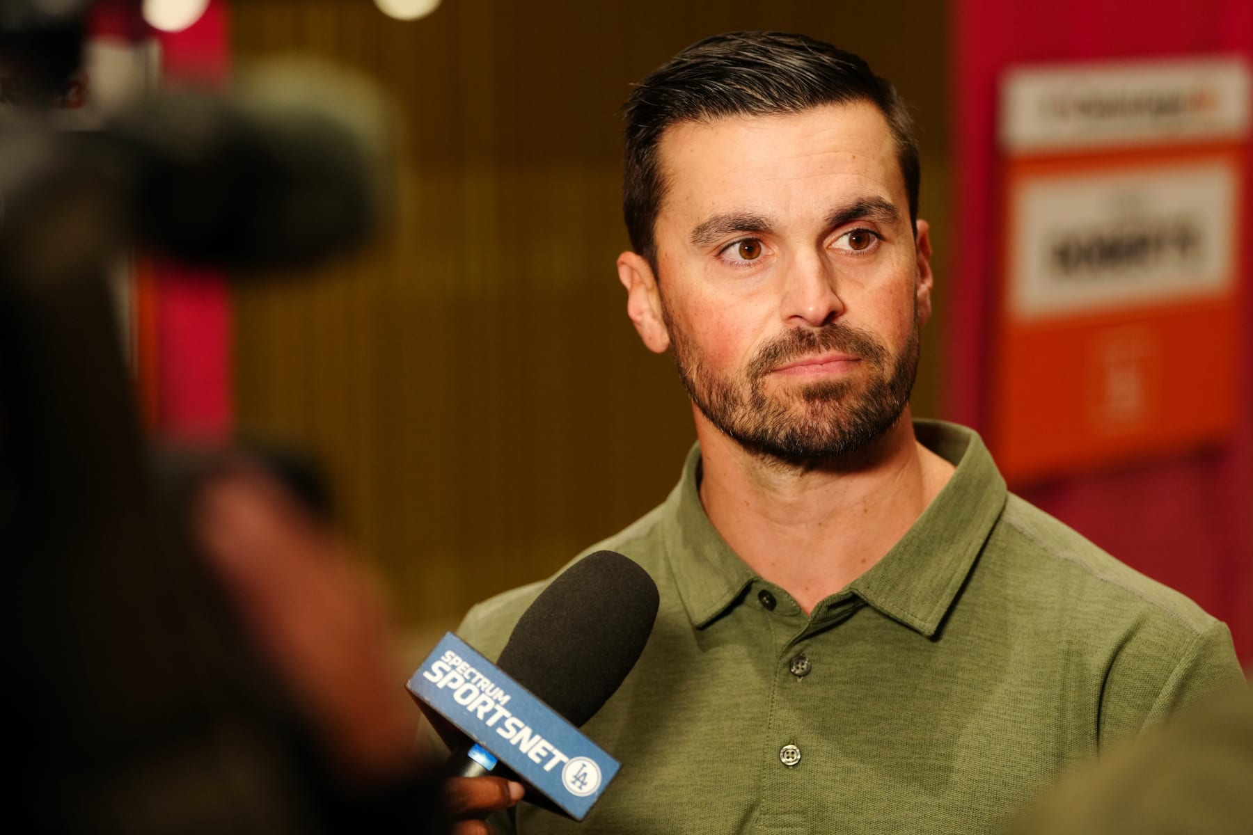 PHOENIX, AZ - FEBRUARY 15: Brandon Gomes, Executive Vice President and General Manager of the Los Angeles Dodgers, speaks to the media during the Spring Training Cactus League Media Day at Arizona Biltmore on Wednesday, February 15, 2023 in Phoenix, Arizona. (Photo by Daniel Shirey/MLB Photos via Getty Images)