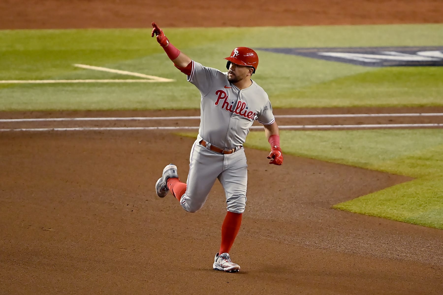 PHOENIX, ARIZONA - OCTOBER 20: Kyle Schwarber #12 of the Philadelphia Phillies celebrates his solo home run against the Arizona Diamondbacks in the fourth inning during Game Four of the National League Championship Series at Chase Field on October 20, 2023 in Phoenix, Arizona. (Photo by Norm Hall/Getty Images)