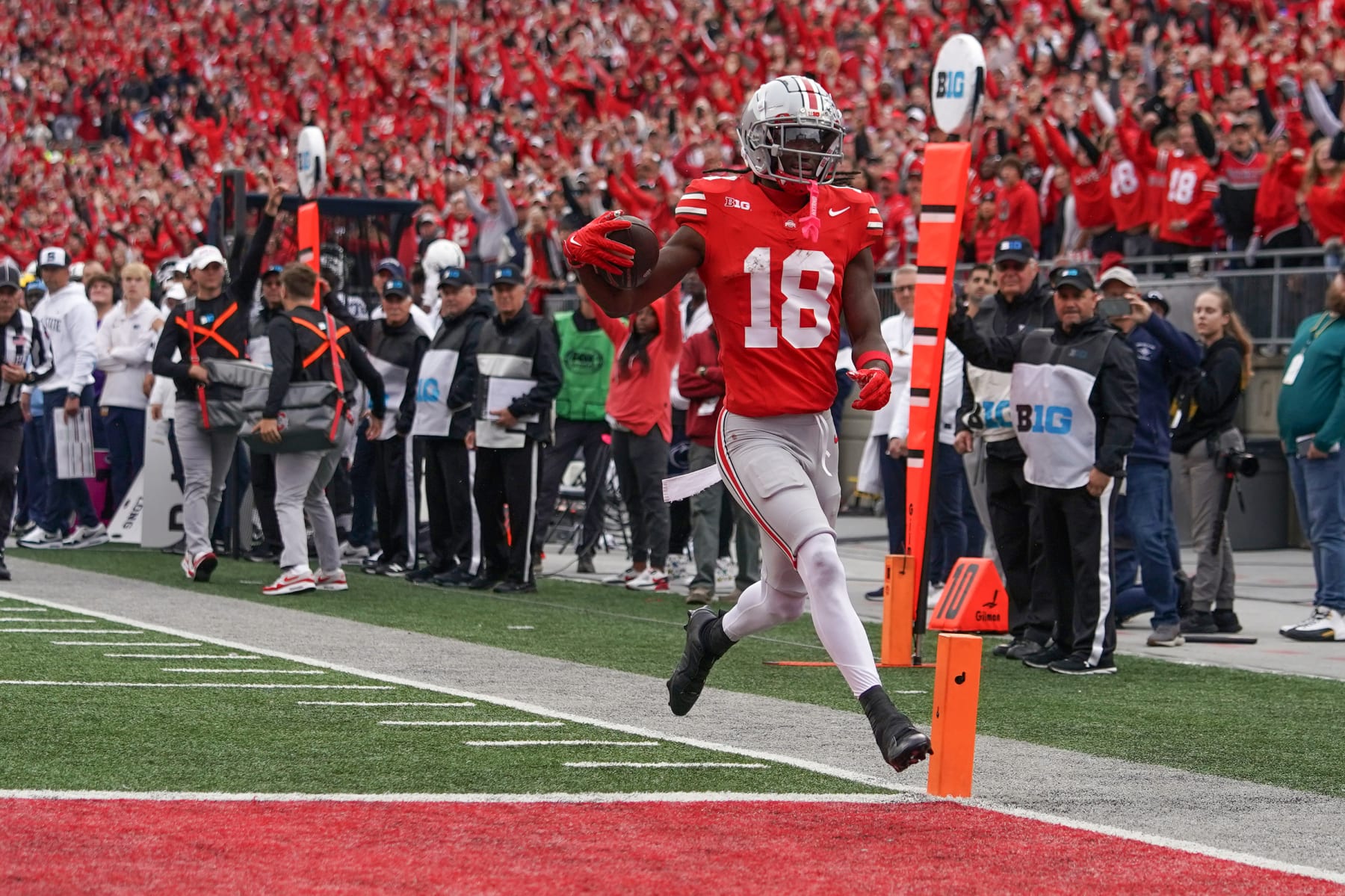 COLUMBUS, OH - OCTOBER 21: Wide receiver Marvin Harrison Jr. #18 of the Ohio State Buckeyes scores a touchdown during the game against the Penn State Nittany Lionsat Ohio Stadium in Columbus, Ohio on October 21, 2023. (Photo by Jason Mowry/Icon Sportswire via Getty Images)