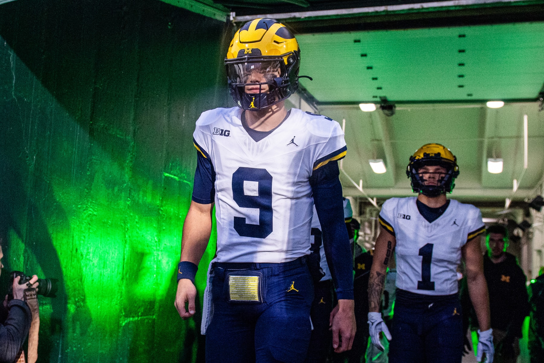 EAST LANSING, MICHIGAN - OCTOBER 21: J.J. McCarthy #9 of the Michigan Wolverines exits the tunnel before a college football game against the Michigan State Spartans at Spartan Stadium on October 21, 2023 in East Lansing, Michigan. (Photo by Aaron J. Thornton/Getty Images)