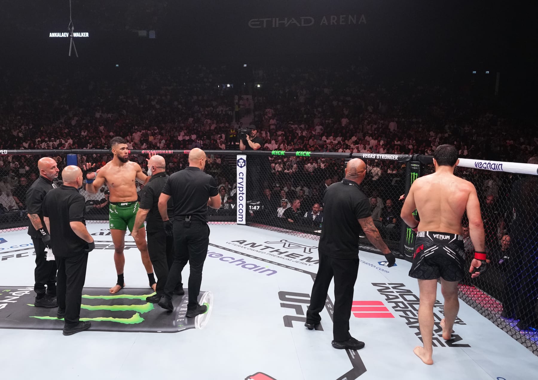 ABU DHABI, UNITED ARAB EMIRATES - OCTOBER 21: (L-R) Johnny Walker of Brazil and Magomed Ankalaev of Russia react after the stoppage of their light heavyweight fight due to an unintentional foul during the UFC 294 event at Etihad Arena on October 21, 2023 in Abu Dhabi, United Arab Emirates. (Photo by Chris Unger/Zuffa LLC via Getty Images)