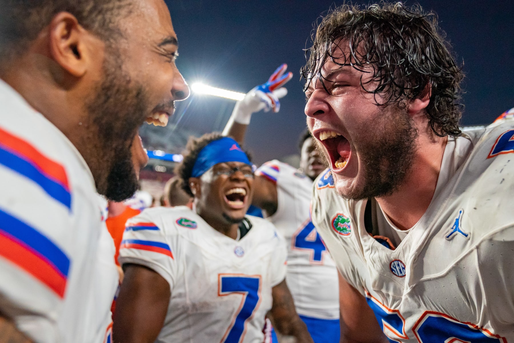 COLUMBIA, SOUTH CAROLINA - OCTOBER 14: (R-L) Austin Barber #58 of the Florida Gators celebrates with Derek Wingo #15 after defeating the South Carolina Gamecocks during their game at Williams-Brice Stadium on October 14, 2023 in Columbia, South Carolina. (Photo by Jacob Kupferman/Getty Images)