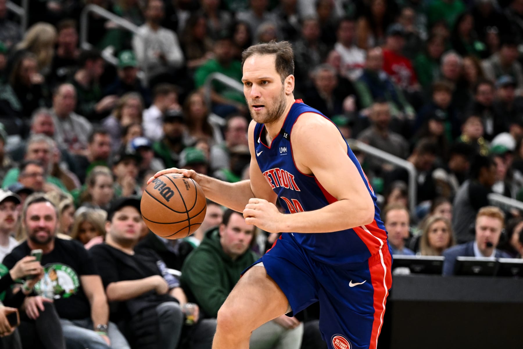 BOSTON, MASSACHUSETTS - FEBRUARY 15: Bojan Bogdanovic #44 of the Detroit Pistons dribbles the ball against the Boston Celtics during the fourth quarter at the TD Garden on February 15, 2023 in Boston, Massachusetts. NOTE TO USER: User expressly acknowledges and agrees that, by downloading and or using this photograph, User is consenting to the terms and conditions of the Getty Images License Agreement. (Photo by Brian Fluharty/Getty Images)