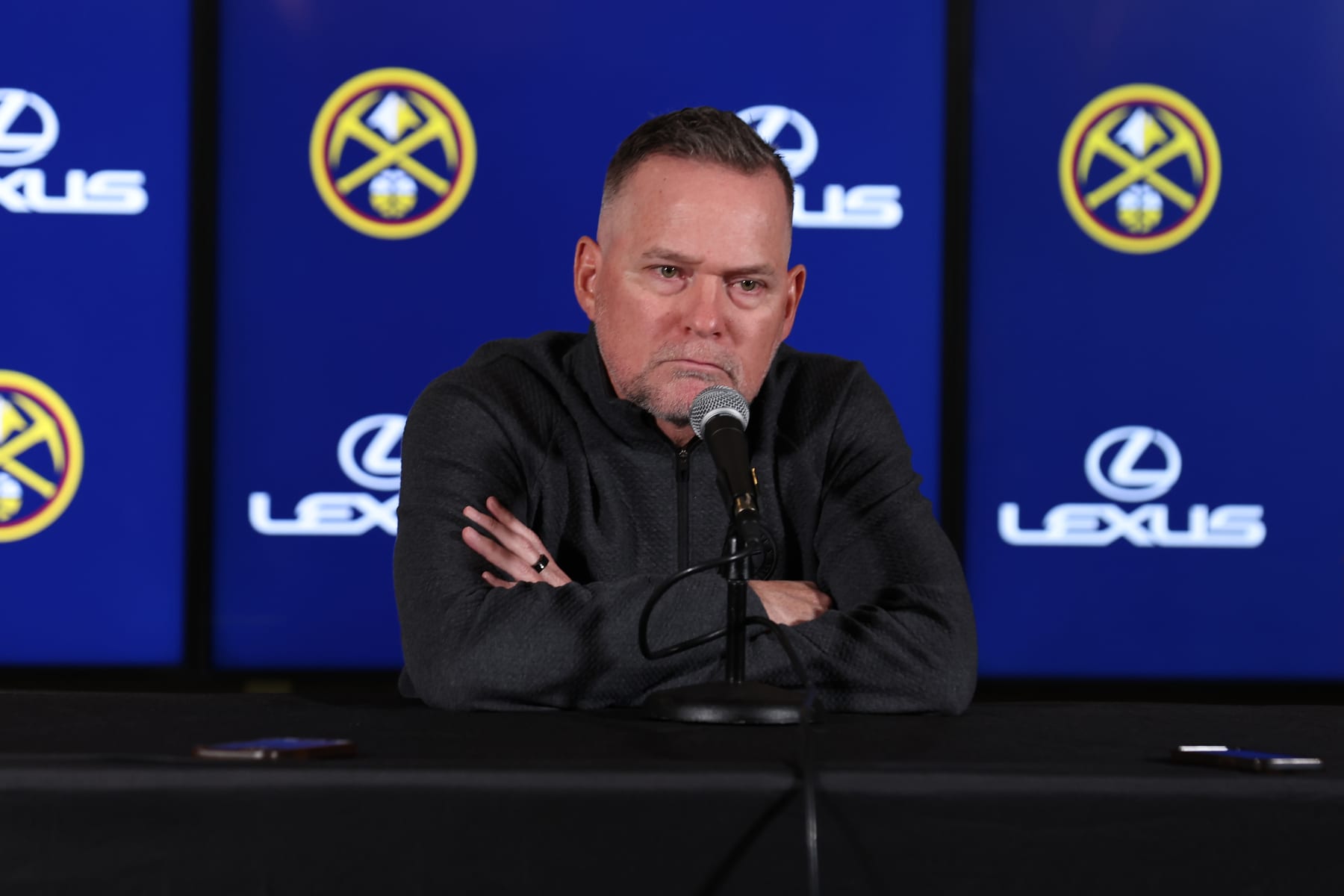DENVER, COLORADO - OCTOBER 24: Denver Nuggets head coach Michael Malone speaks in a pre-game press conference before the game against the Los Angeles Lakers at Ball Arena on October 24, 2023 in Denver, Colorado. (Photo by Justin Tafoya/Getty Images)