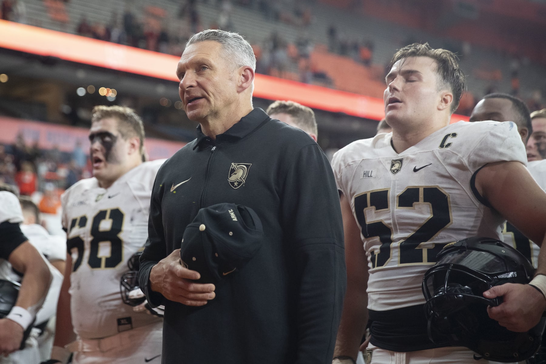 SYRACUSE, NEW YORK - SEPTEMBER 23: Head coach Jeff Monken of the Army Black Knights sings the Alma Mater after the game against Syracuse at JMA Wireless Dome on September 23, 2023 in Syracuse, New York. (Photo by Edward Diller/Getty Images)
