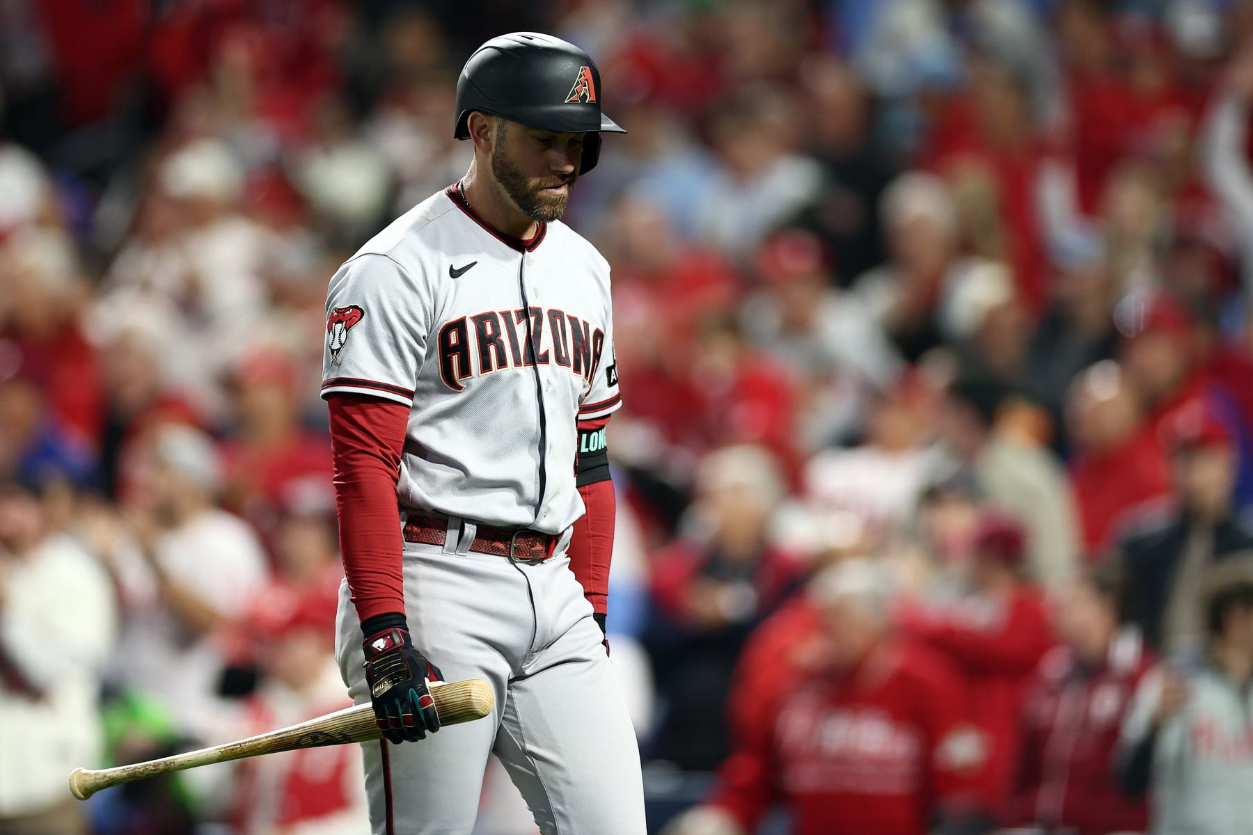 PHILADELPHIA, PENNSYLVANIA - OCTOBER 24: Evan Longoria #3 of the Arizona Diamondbacks reacts after striking out against the Philadelphia Phillies during the fourth inning in Game Seven of the Championship Series at Citizens Bank Park on October 24, 2023 in Philadelphia, Pennsylvania. (Photo by Elsa/Getty Images)