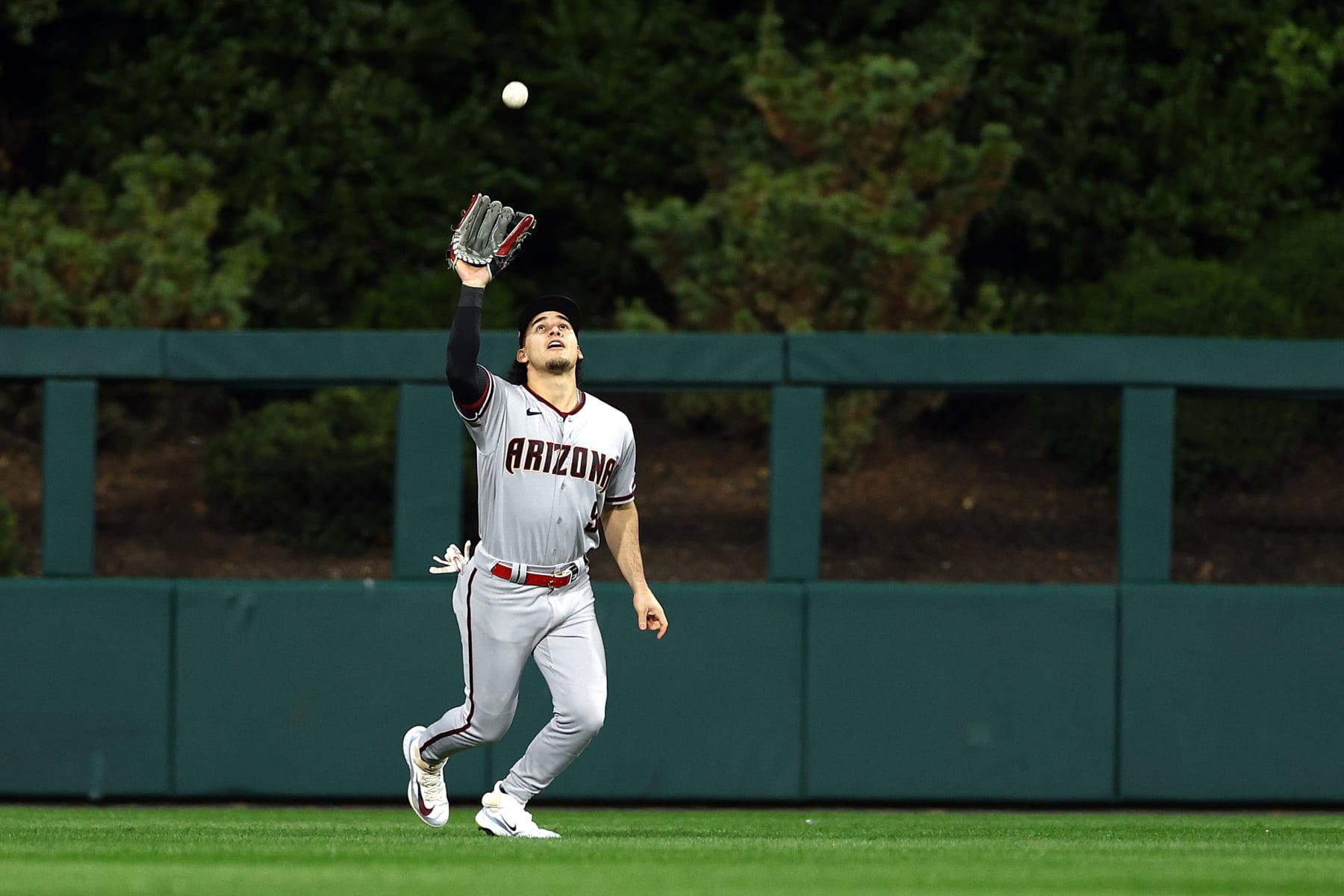 PHILADELPHIA, PENNSYLVANIA - OCTOBER 24: Alek Thomas #5 of the Arizona Diamondbacks catches a fly ball against the Philadelphia Phillies during the seventh inning in Game Seven of the Championship Series at Citizens Bank Park on October 24, 2023 in Philadelphia, Pennsylvania. (Photo by Elsa/Getty Images)