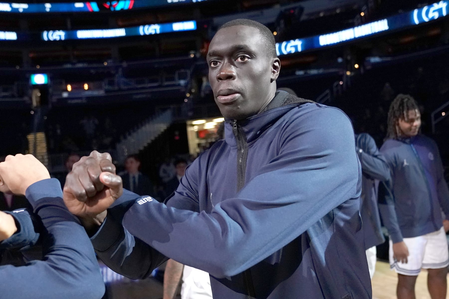 WASHINGTON, DC - JANUARY 24: Akok Akok #11 of the Georgetown Hoyas is introduced before a college basketball game against the DePaul Blue Demons at the Capital One Arena on January 24, 2023 in Washington, DC. (Photo by Mitchell Layton/Getty Images)