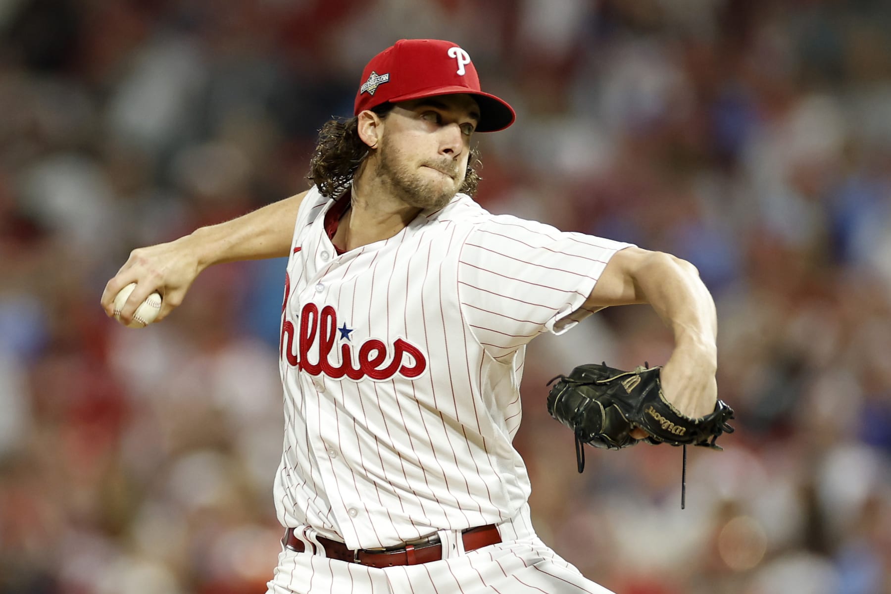 PHILADELPHIA, PENNSYLVANIA - OCTOBER 17: Aaron Nola #27 of the Philadelphia Phillies throws a first inning pitch against the Arizona Diamondbacks during Game Two of the Championship Series at Citizens Bank Park on October 17, 2023 in Philadelphia, Pennsylvania. (Photo by Sarah Stier/Getty Images)