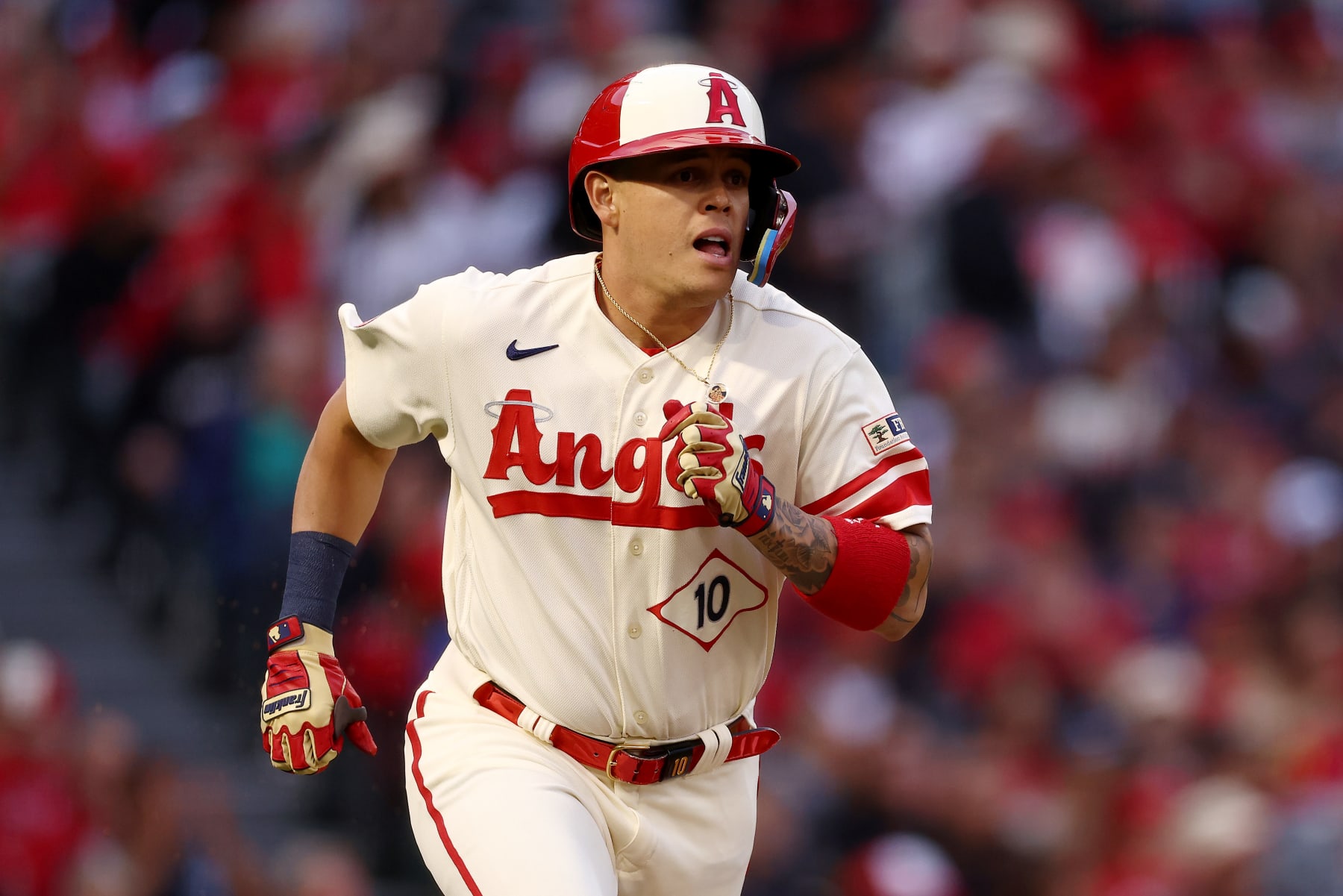 ANAHEIM, CALIFORNIA - MAY 26: Gio Urshela #10 of the Los Angeles Angels jogs to first base after hitting a single during the second inning against the Miami Marlins at Angel Stadium of Anaheim on May 26, 2023 in Anaheim, California. (Photo by Katelyn Mulcahy/Getty Images)