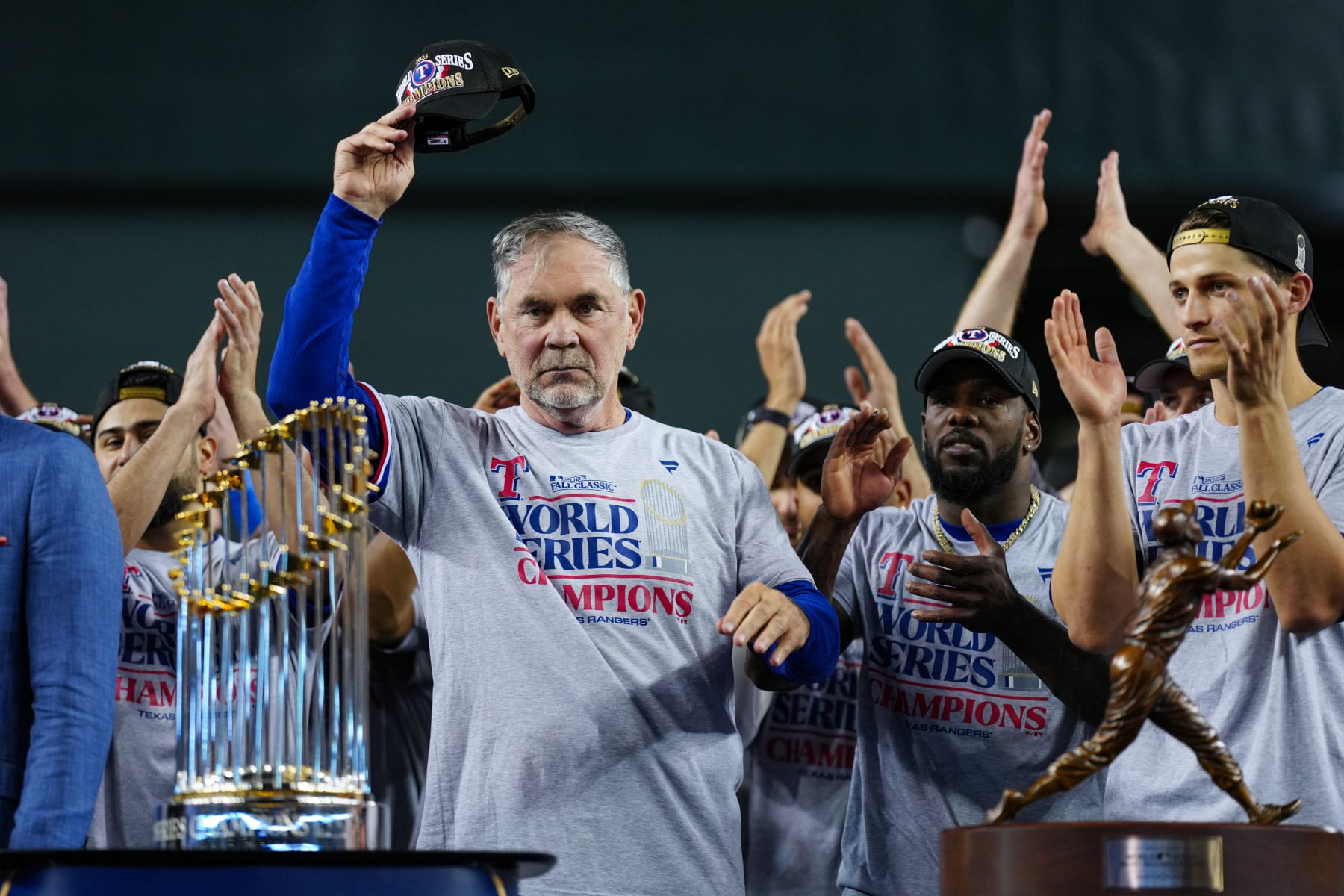 PHOENIX, AZ - NOVEMBER 01: Manager Bruce Bochy #15 of the Texas Rangers acknowledges the crowd during the trophy presentation after Game 5 of the 2023 World Series between the Texas Rangers and the Arizona Diamondbacks at Chase Field on Wednesday, November 1, 2023 in Phoenix, Arizona. The Texas Rangers won the World Series 5-0. (Photo by Daniel Shirey/MLB Photos via Getty Images)