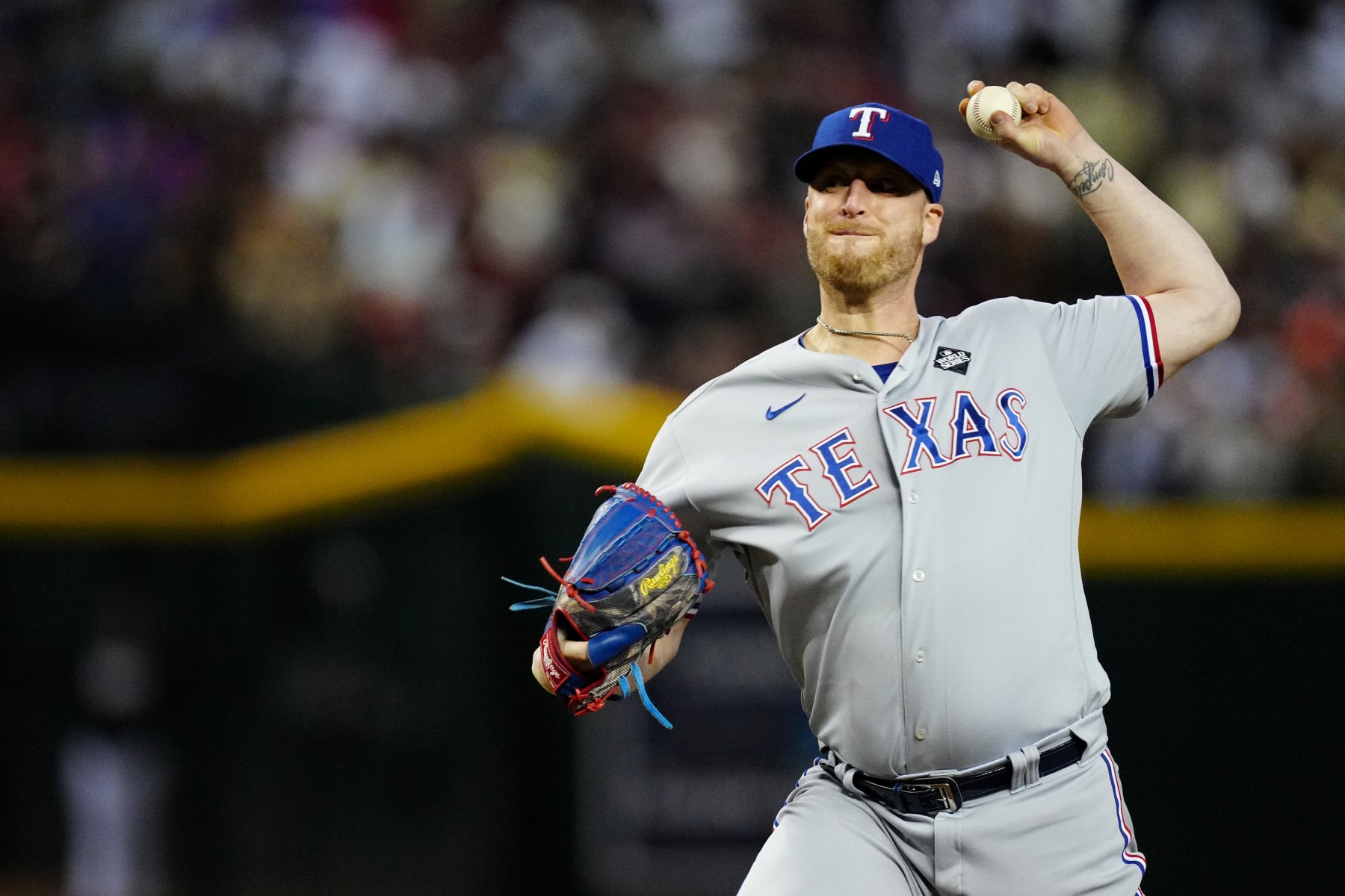PHOENIX, AZ - OCTOBER 31: Will Smith #51 of the Texas Rangers pitches during Game 4 of the 2023 World Series between the Texas Rangers and the Arizona Diamondbacks at Chase Field on Tuesday, October 31, 2023 in Phoenix, Arizona. (Photo by Mary DeCicco/MLB Photos via Getty Images)