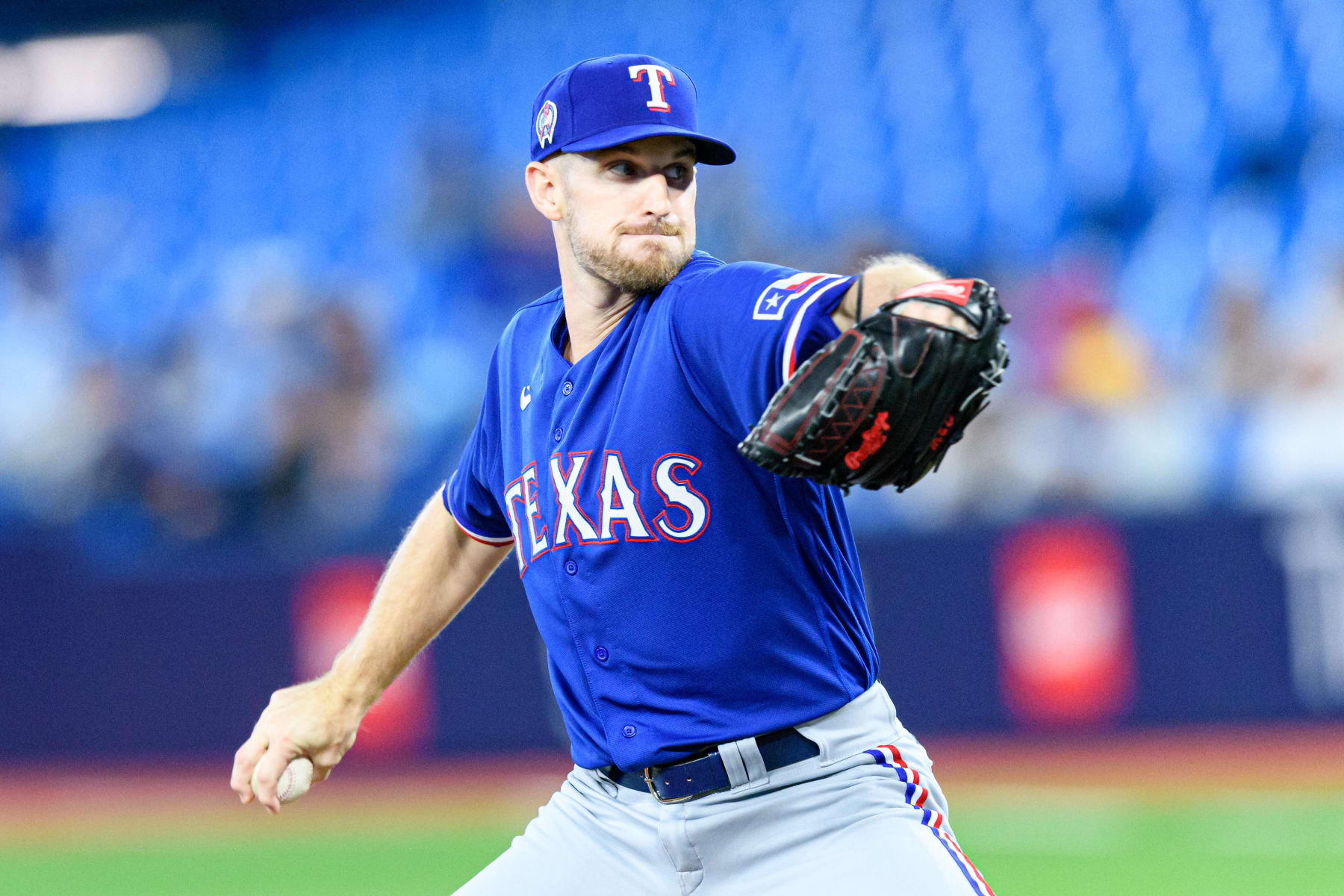 TORONTO, ON - SEPTEMBER 11: Texas Rangers Pitcher Chris Stratton (35) throws a pitch during the MLB baseball regular season game between the Texas Rangers and the Toronto Blue Jays on September 11, 2023, at Rogers Centre in Toronto, ON, Canada. (Photo by Julian Avram/Icon Sportswire via Getty Images)