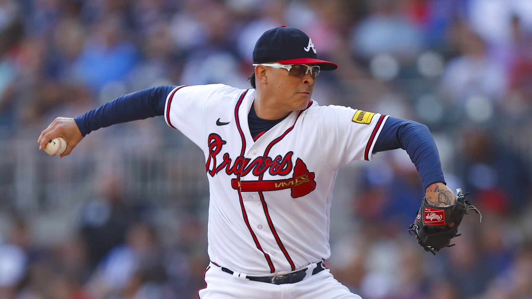 ATLANTA, GEORGIA - OCTOBER 1: Jesse Chavez #60 of the Atlanta Braves pitches during the sixth inning against the Washington Nationals at Truist Park on October 1, 2023 in Atlanta, Georgia. (Photo by Todd Kirkland/Getty Images)