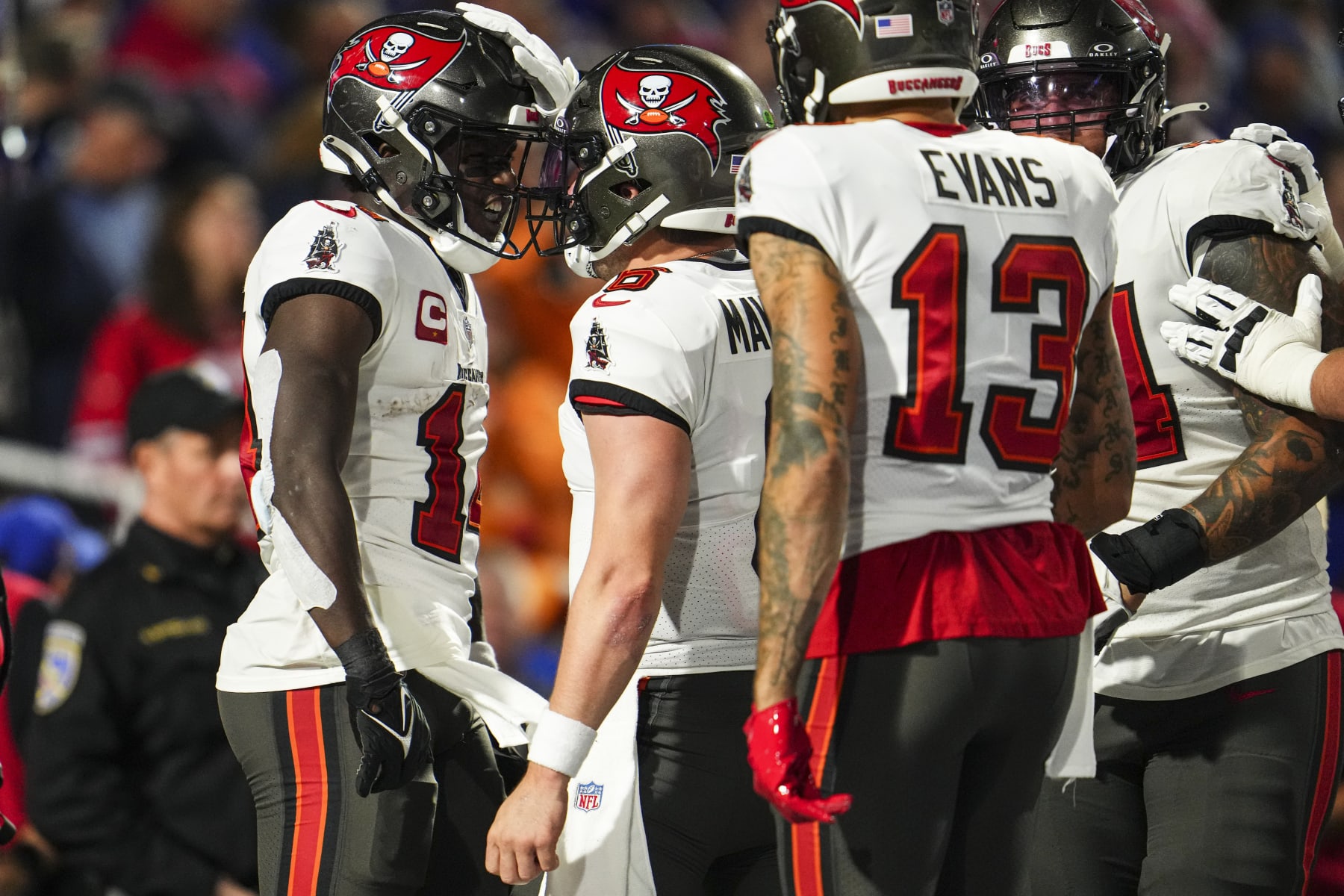 ORCHARD PARK, NY - OCTOBER 26: Chris Godwin #14 of the Tampa Bay Buccaneers celebrates with Baker Mayfield #6 during an NFL football game against the Buffalo Bills at Highmark Stadium on October 26, 2023 in Orchard Park, New York. (Photo by Cooper Neill/Getty Images)