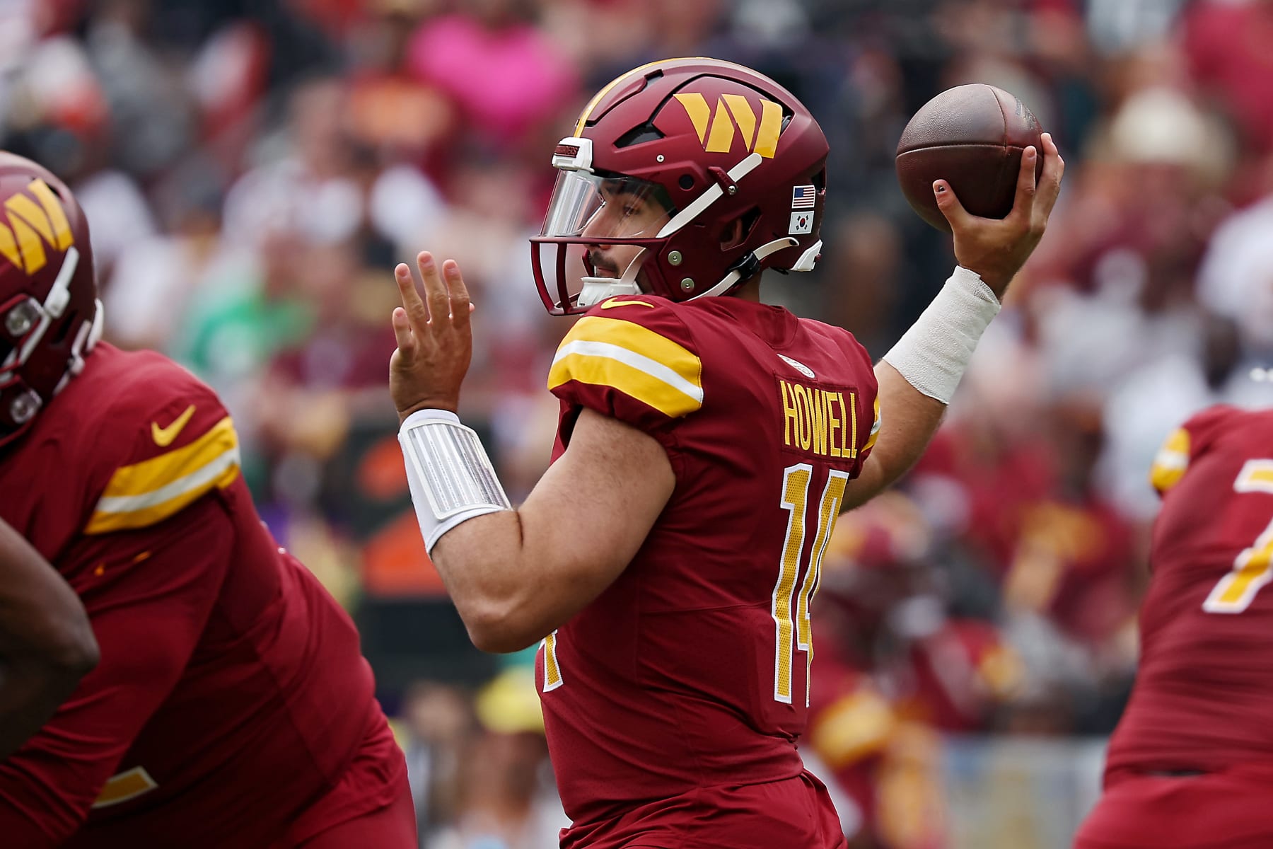 LANDOVER, MARYLAND - OCTOBER 29: Sam Howell #14 of the Washington Commanders throws a pass during the first quarter of a game against the Philadelphia Eagles at FedExField on October 29, 2023 in Landover, Maryland. (Photo by Patrick Smith/Getty Images)