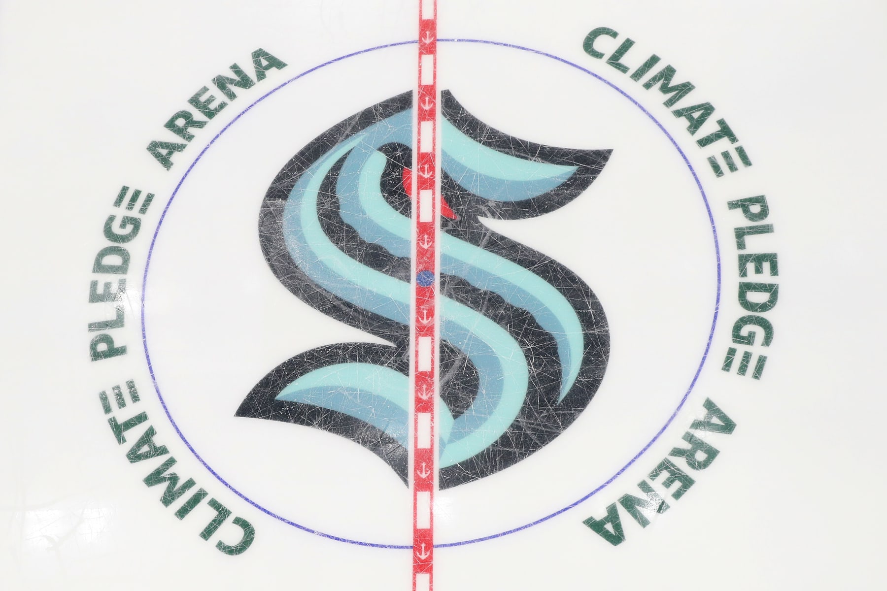 SEATTLE, WASHINGTON - OCTOBER 23: A general view of the Seattle Kraken center ice logo is seen during the first period against the Vancouver Canucks in the Kraken's inaugural home opener on October 23, 2021 at Climate Pledge Arena in Seattle, Washington. (Photo by Steph Chambers/Getty Images)