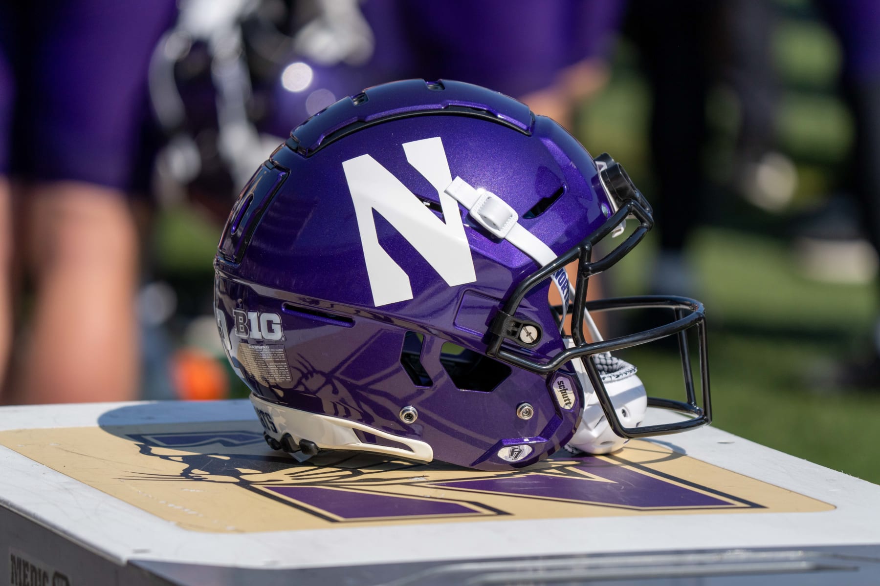 EVANSTON, IL - SEPTEMBER 30: a Northwestern Wildcats football helmet bearing the Northwestern Wildcats logo sits on a trainer's box during the college football game between the Penn State Nittany Lions and the Northwestern Wildcats on September 30, 2023 at Ryan Field in Evanston, IL. (Photo by Ben Hsu/Icon Sportswire via Getty Images)