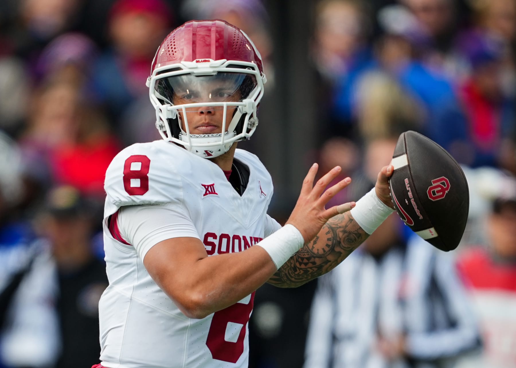 LAWRENCE, KANSAS - OCTOBER 28: Quarterback Dillon Gabriel #8 of the Oklahoma Sooners throws a pass during the first half against the Kansas Jayhawks at David Booth Kansas Memorial Stadium on October 28, 2023 in Lawrence, Kansas. (Photo by Jay Biggerstaff/Getty Images)